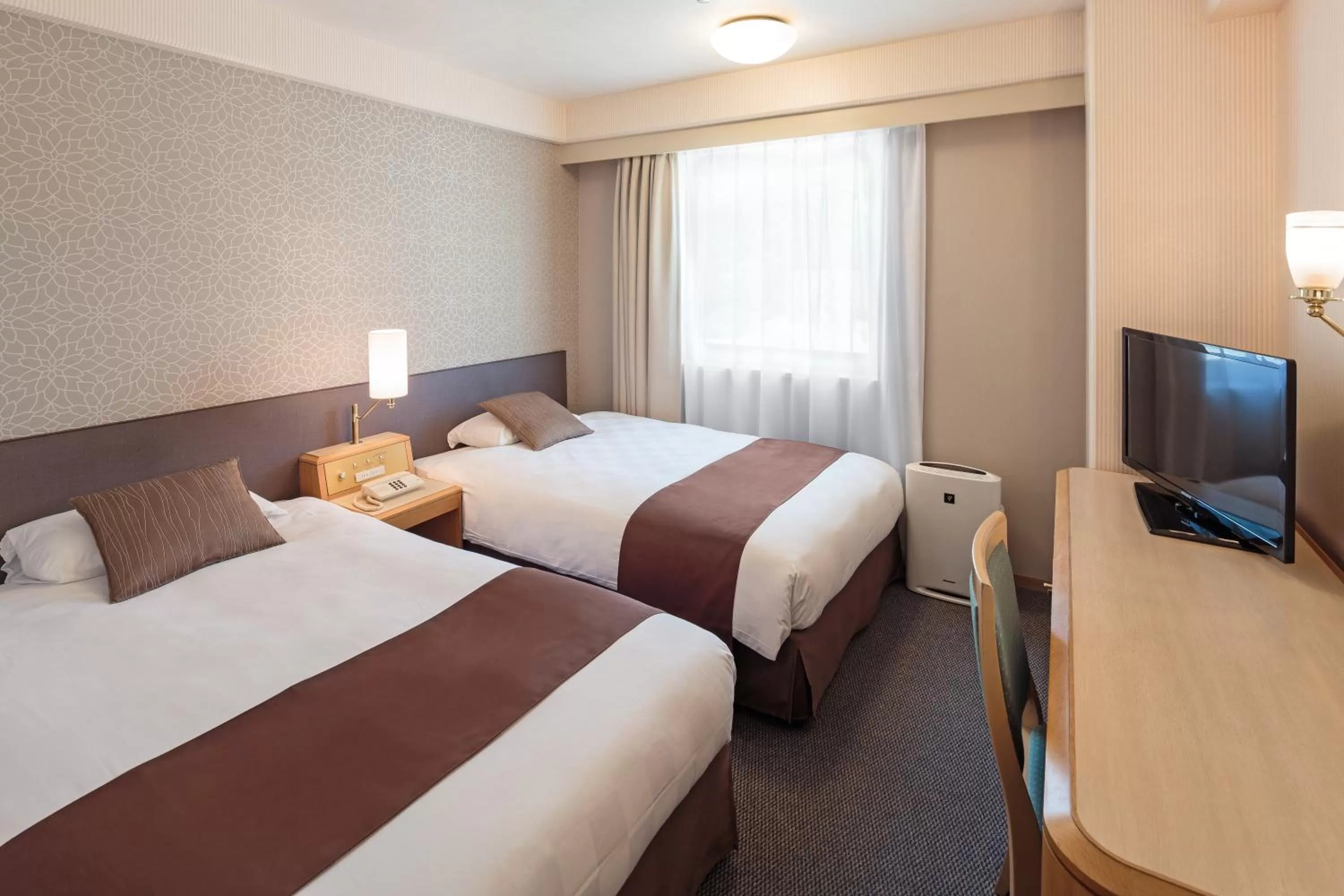 Decorative detail, Bed in Matsuyama Tokyu REI Hotel