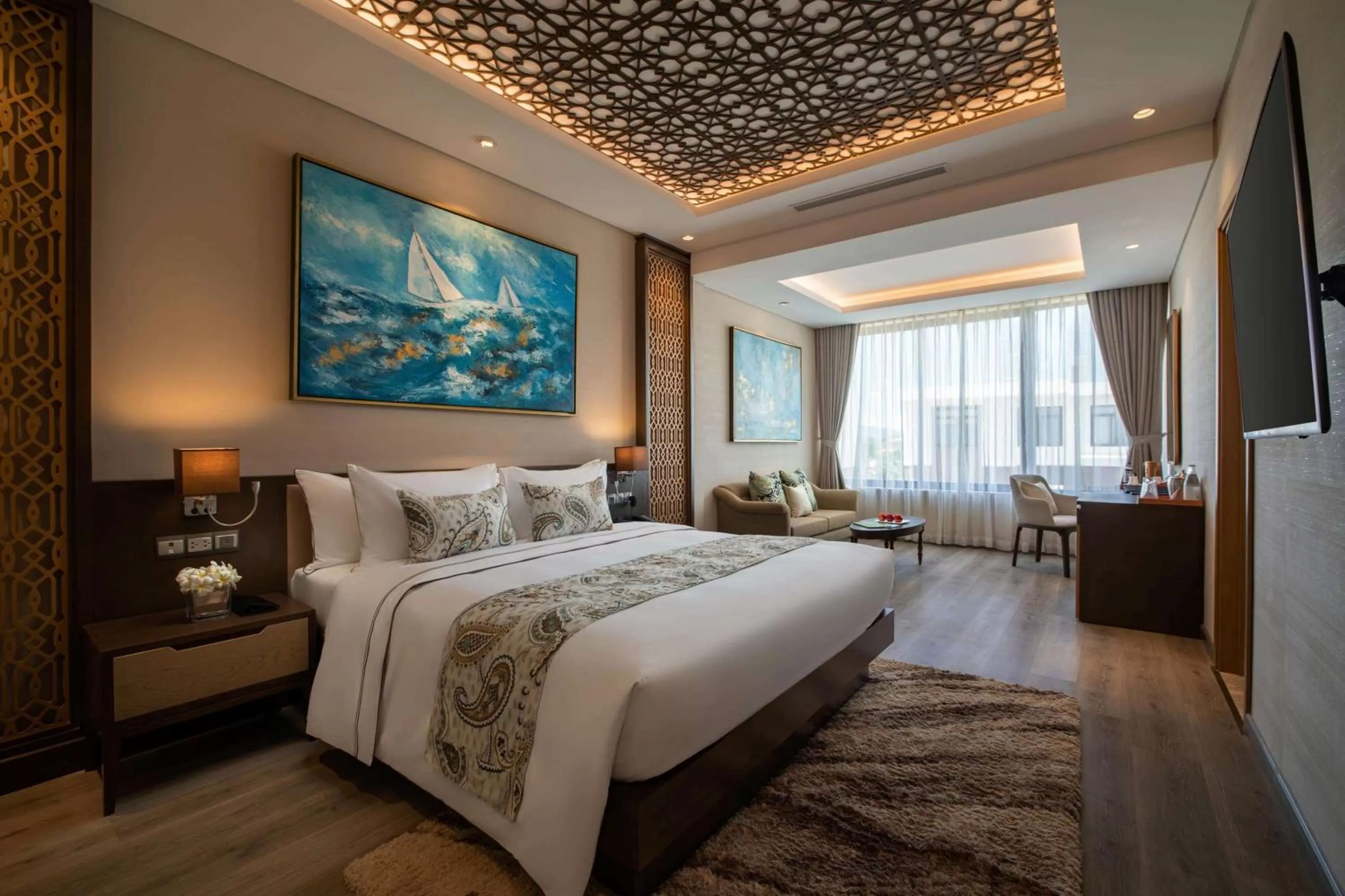 Photo of the whole room, Bed in Wyndham Grand KN Paradise Cam Ranh