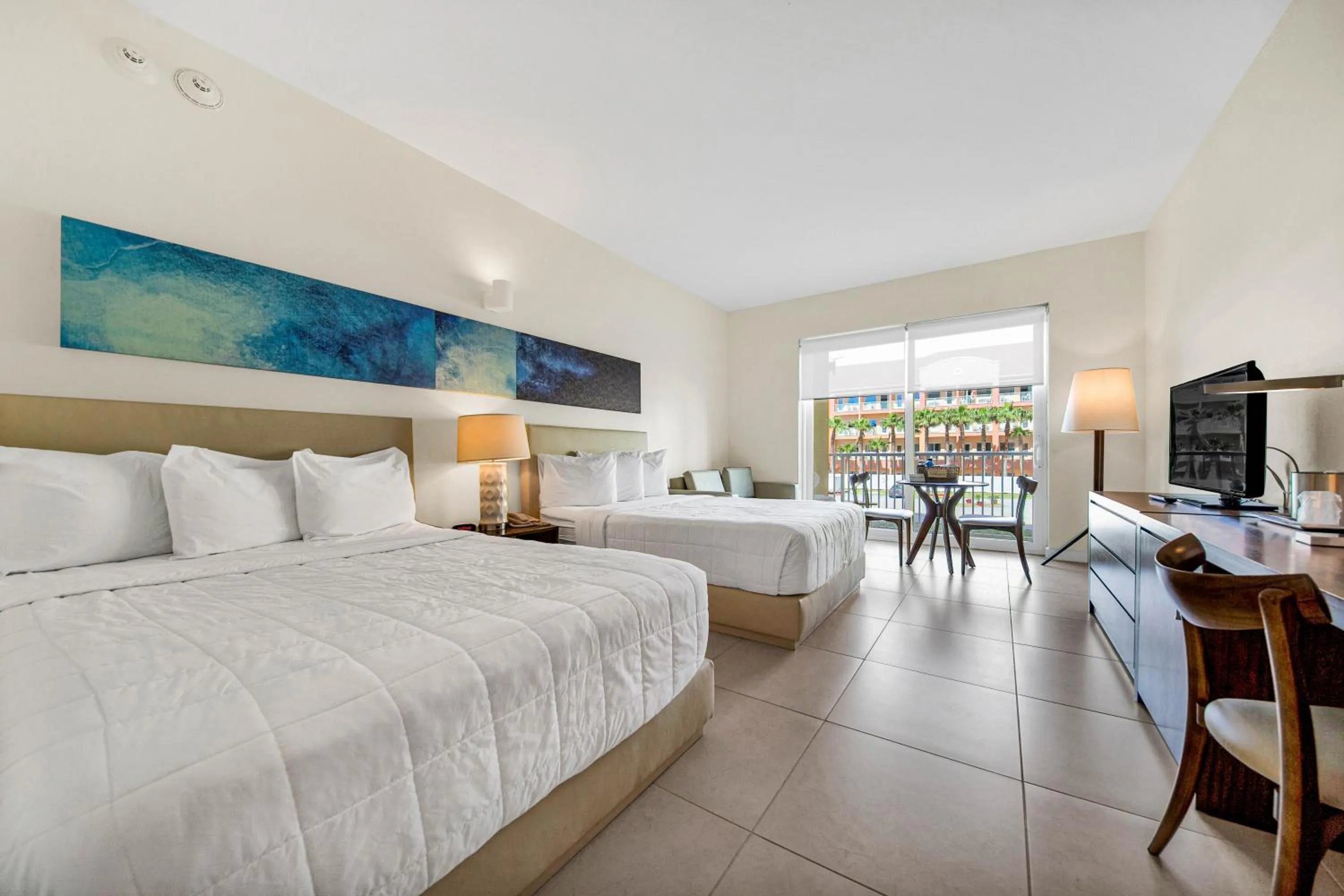 Photo of the whole room, Bed in Peninsula Island Resort & Spa - Beachfront Property at South Padre Island