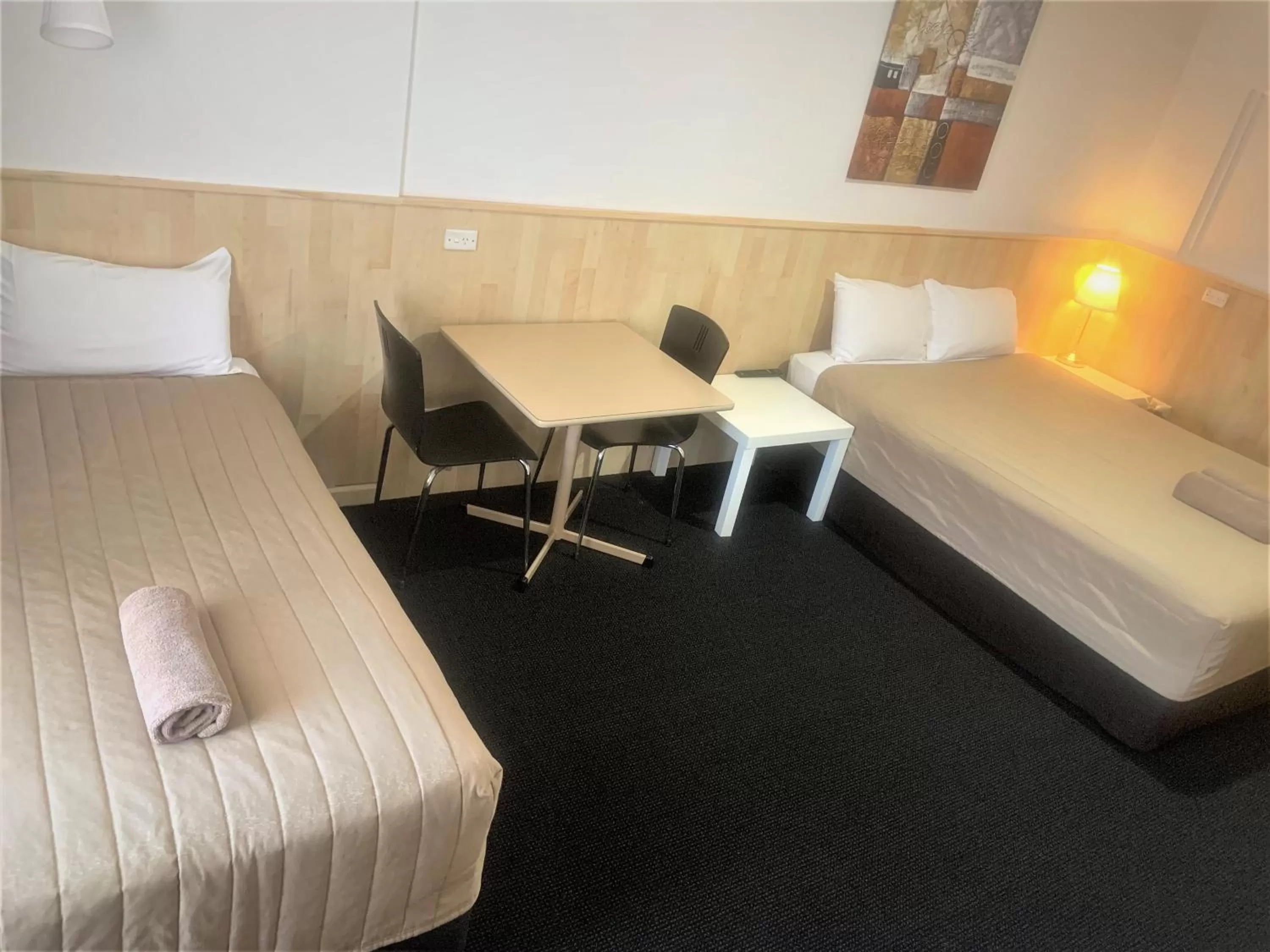 Bed in Countryman Motor Inn Cowra