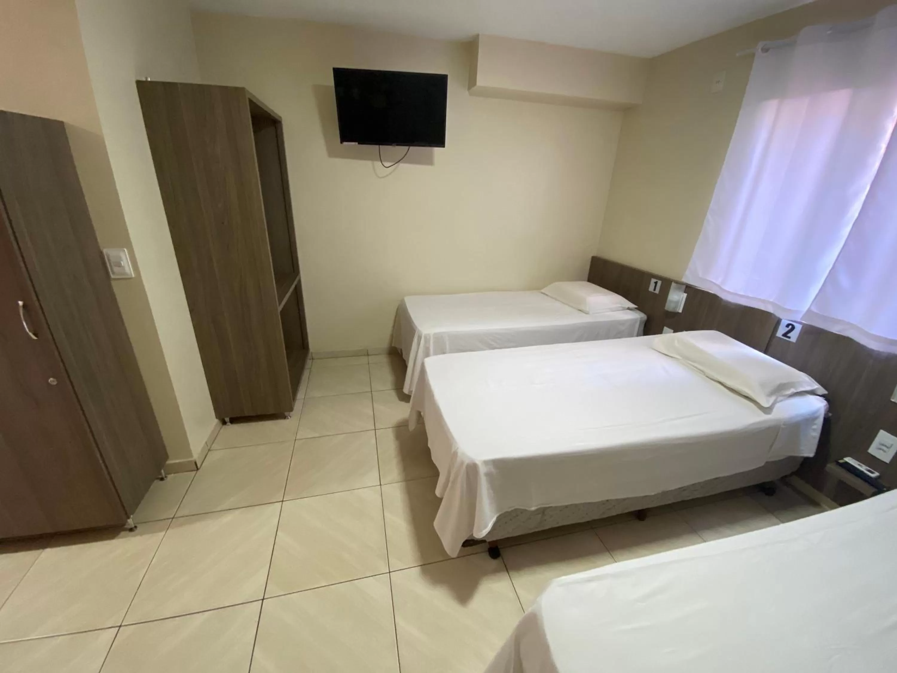 Bed in Pousada El Shaddai