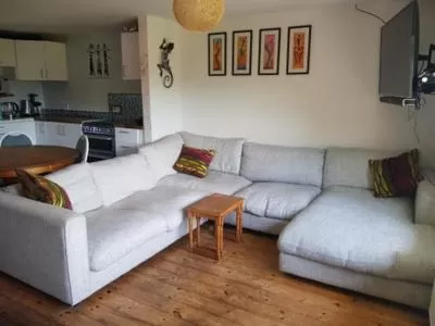 Communal lounge/ TV room, Seating Area in Middle Cottage Sandy Haven Beach