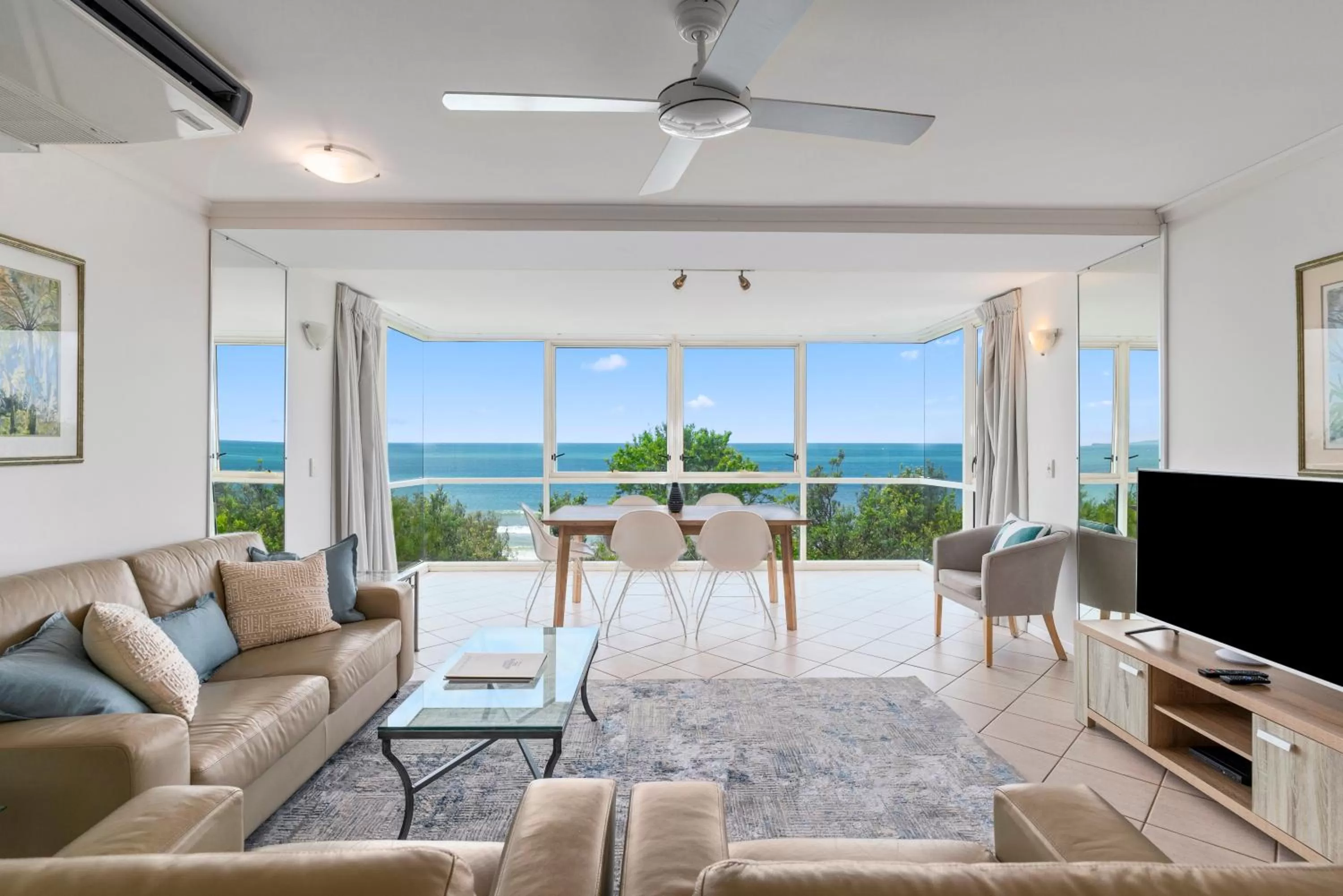 Living room in 84 The Spit Holiday Apartments