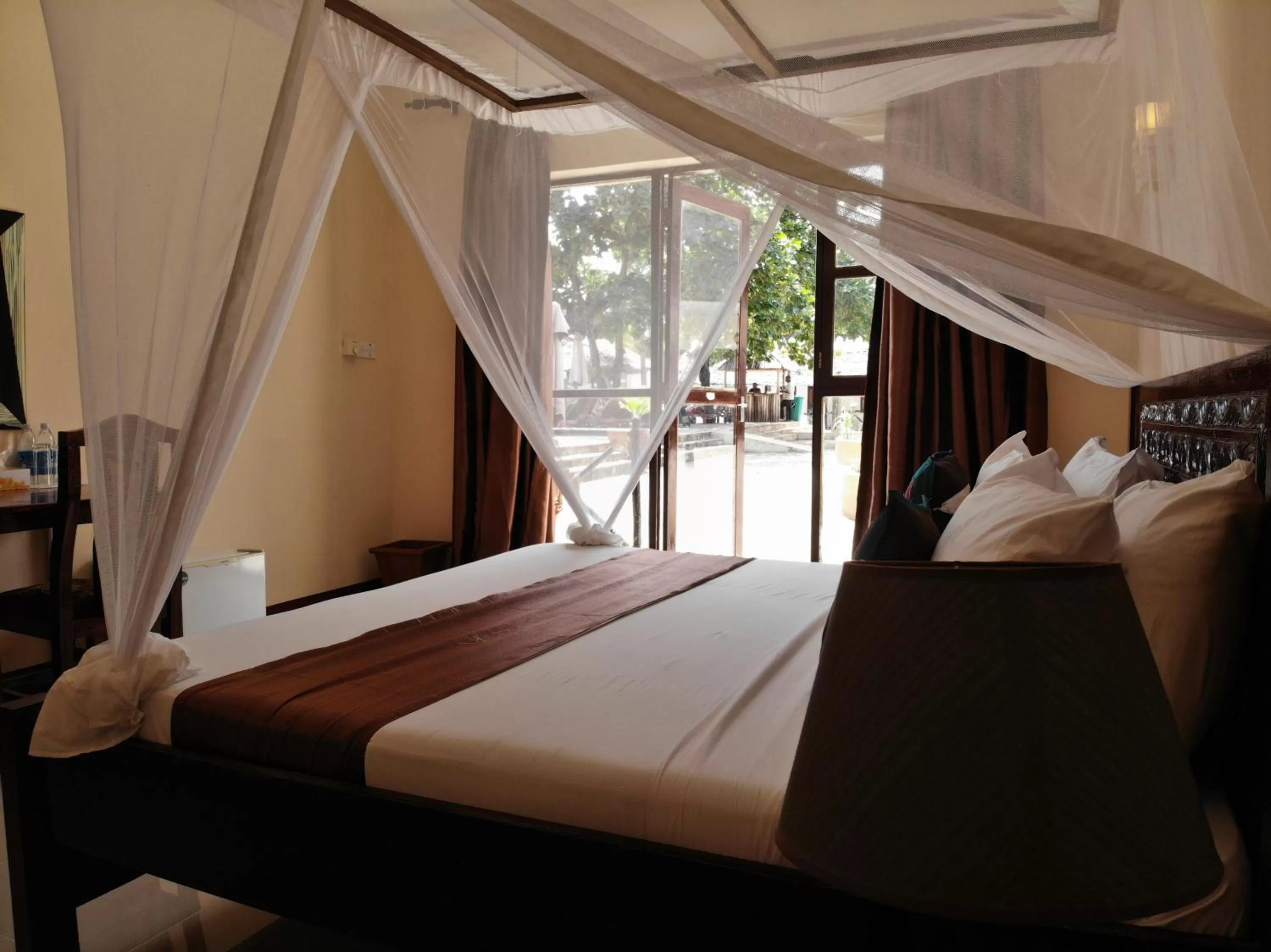 Bed in Amaan Beach Bungalows