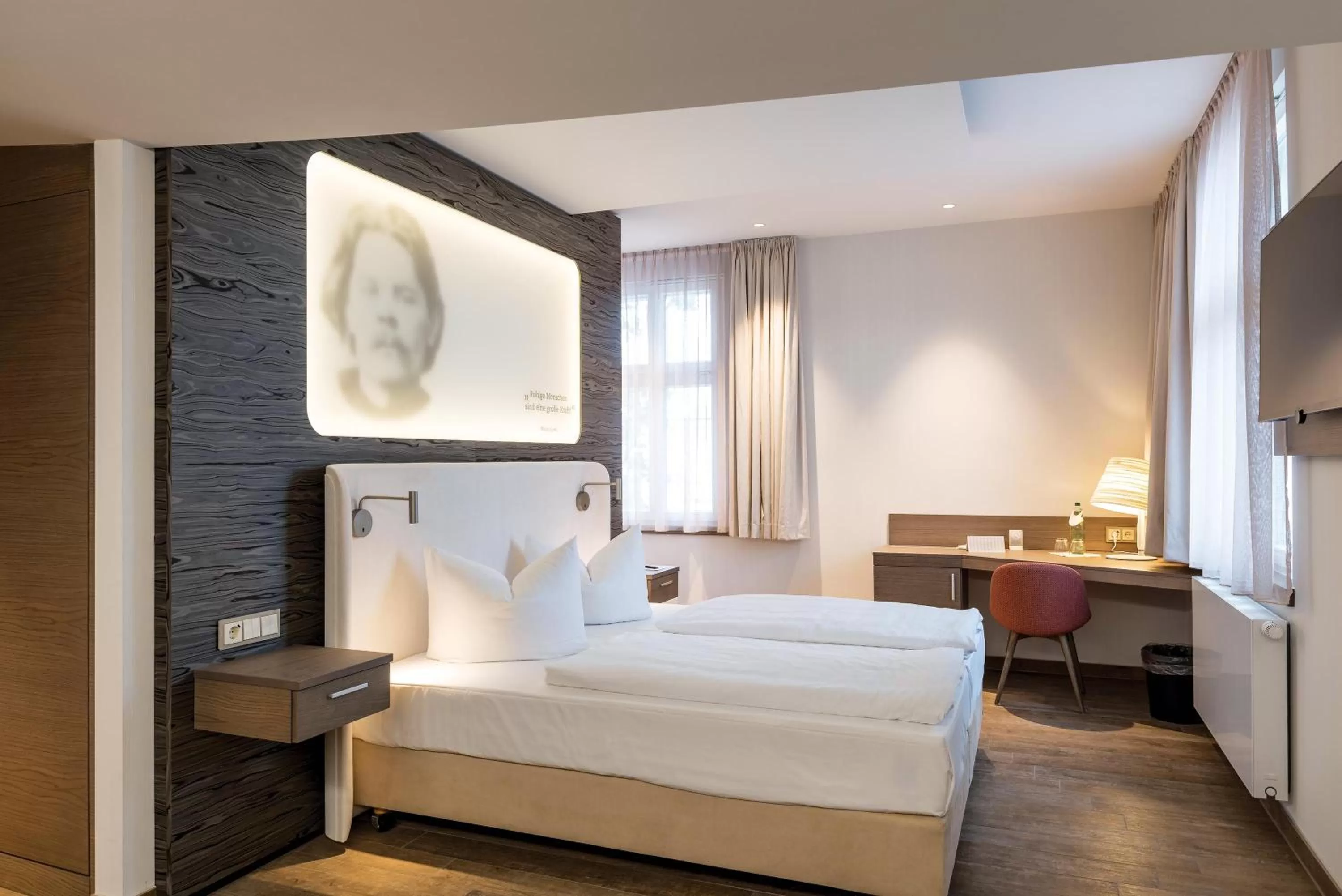 Bed in SEETELHOTEL Strandhotel Atlantic das Boutiquehotel am Meer