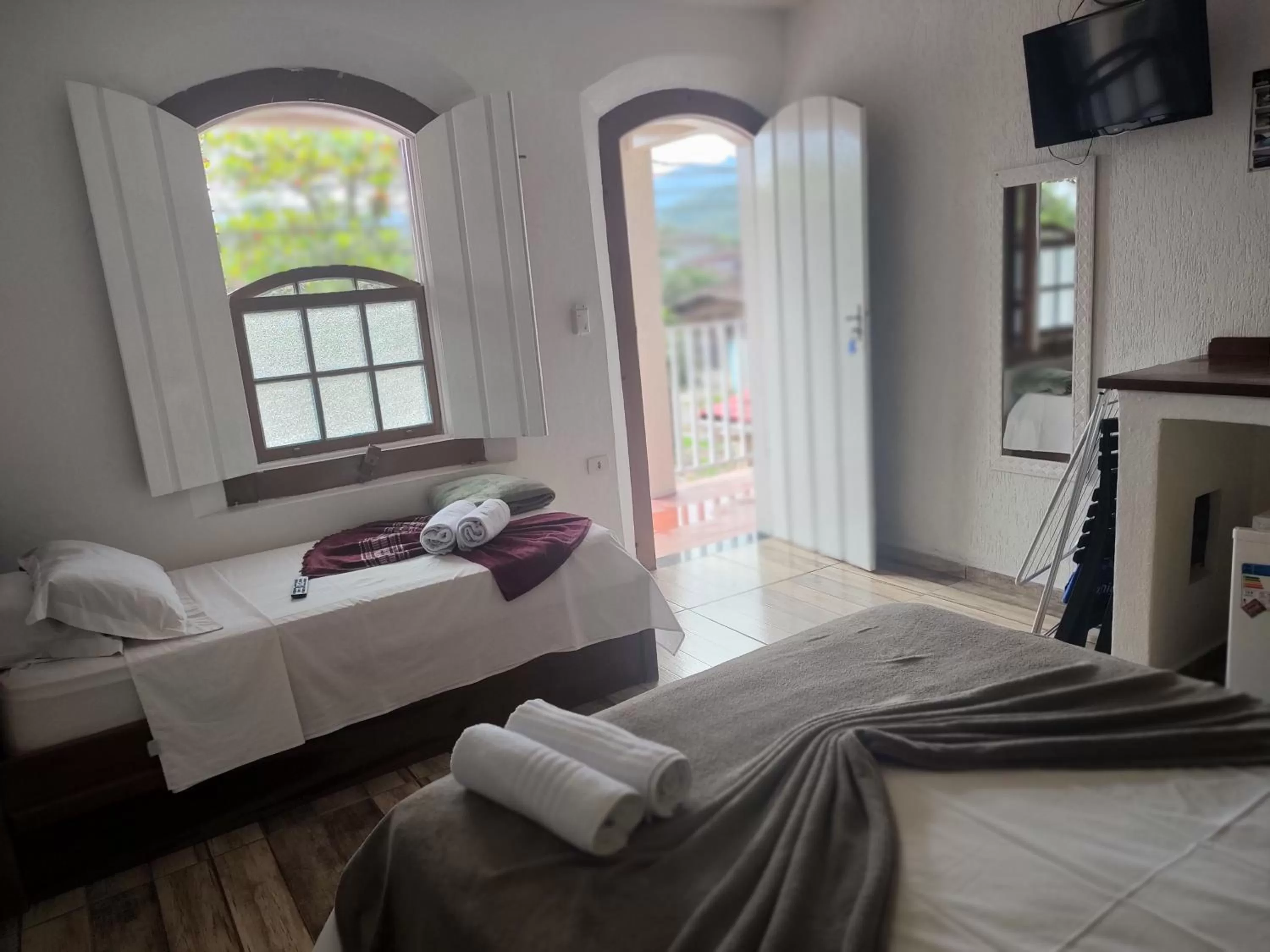 Bedroom, Bed in Hotel Lazaro Ubatuba Ltda