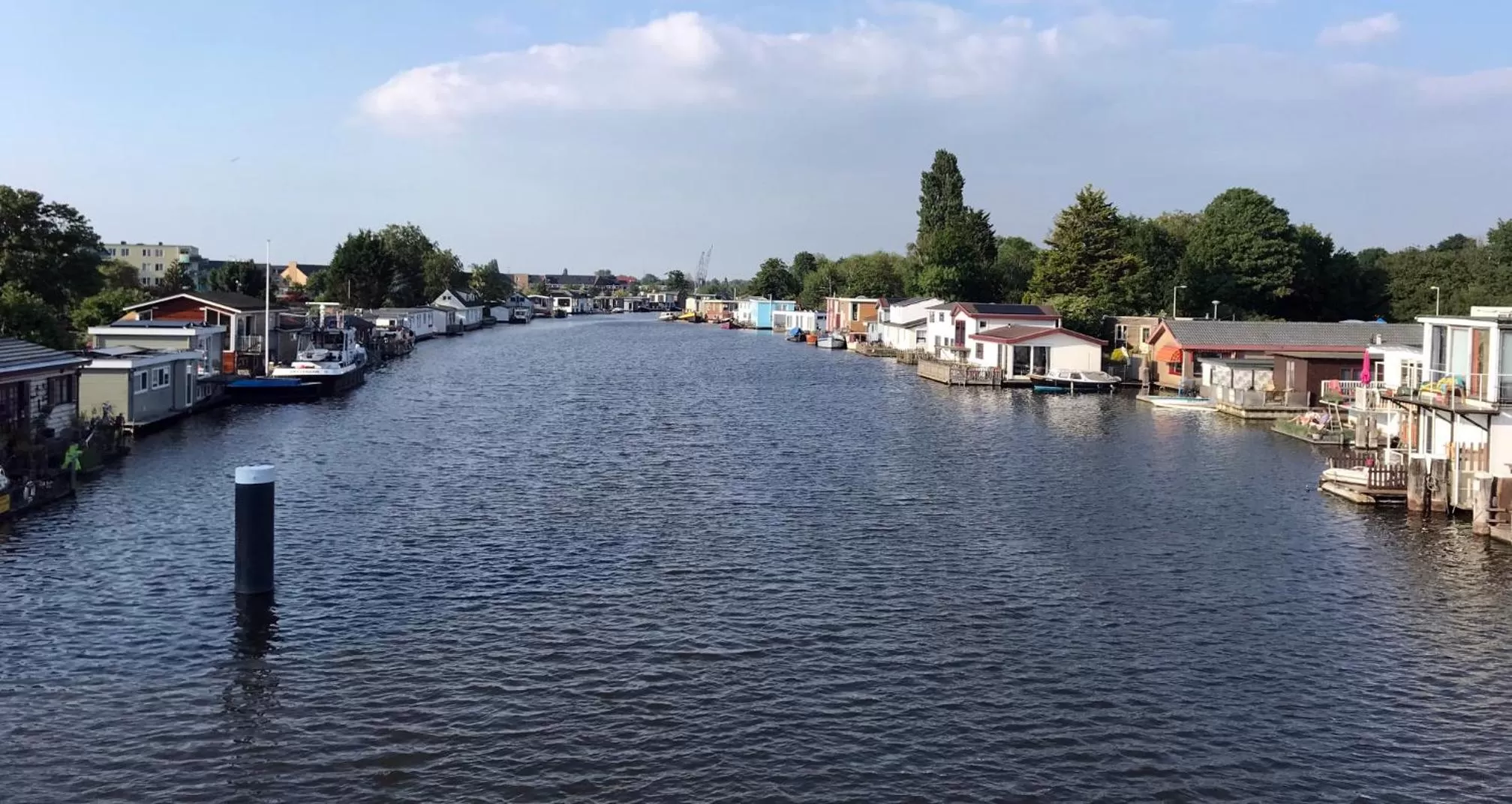 Neighbourhood in Houseboat apartment with water terrace, free parking, free bikes & fast wifi