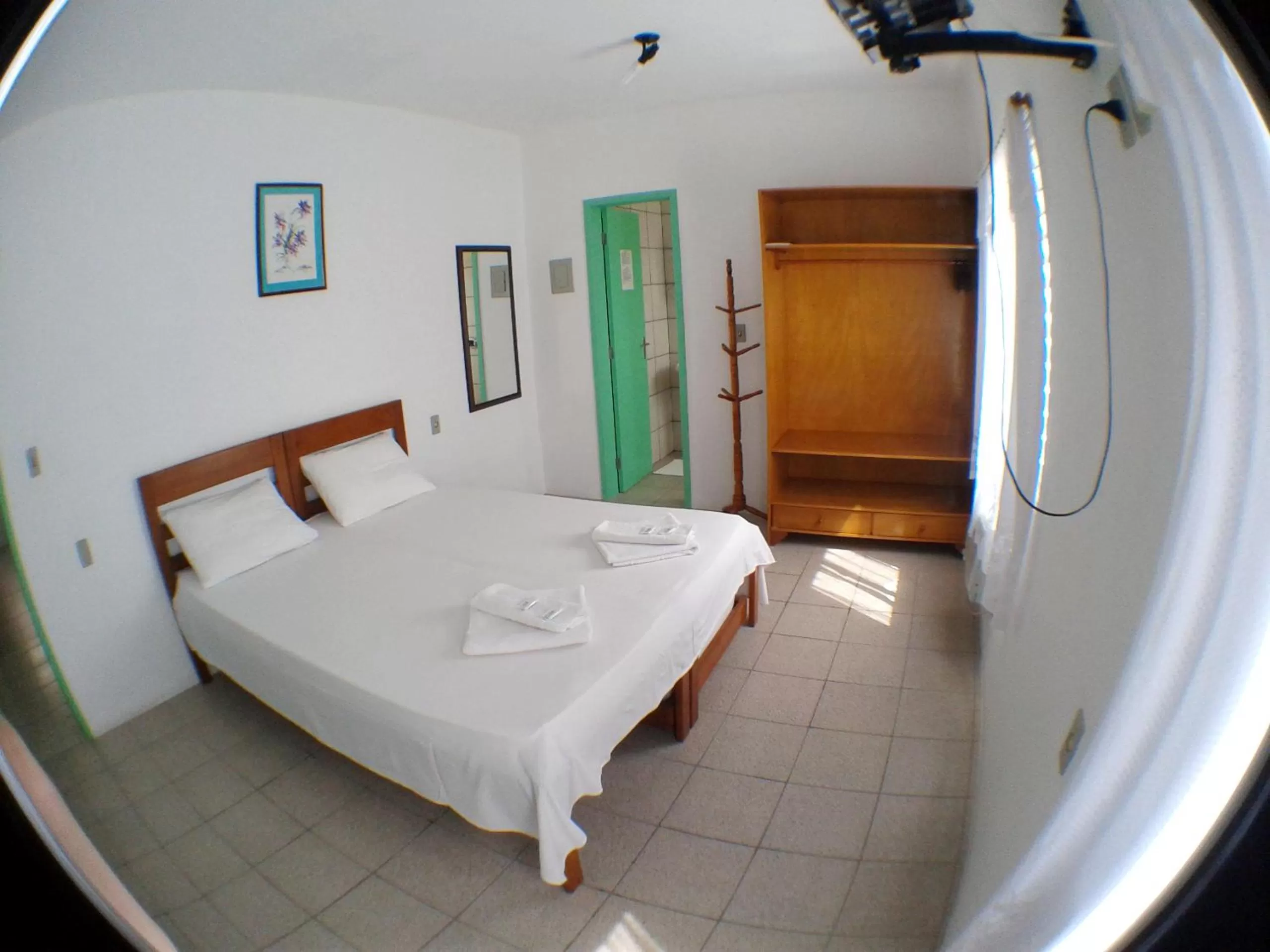 Bed in Pousada Milani