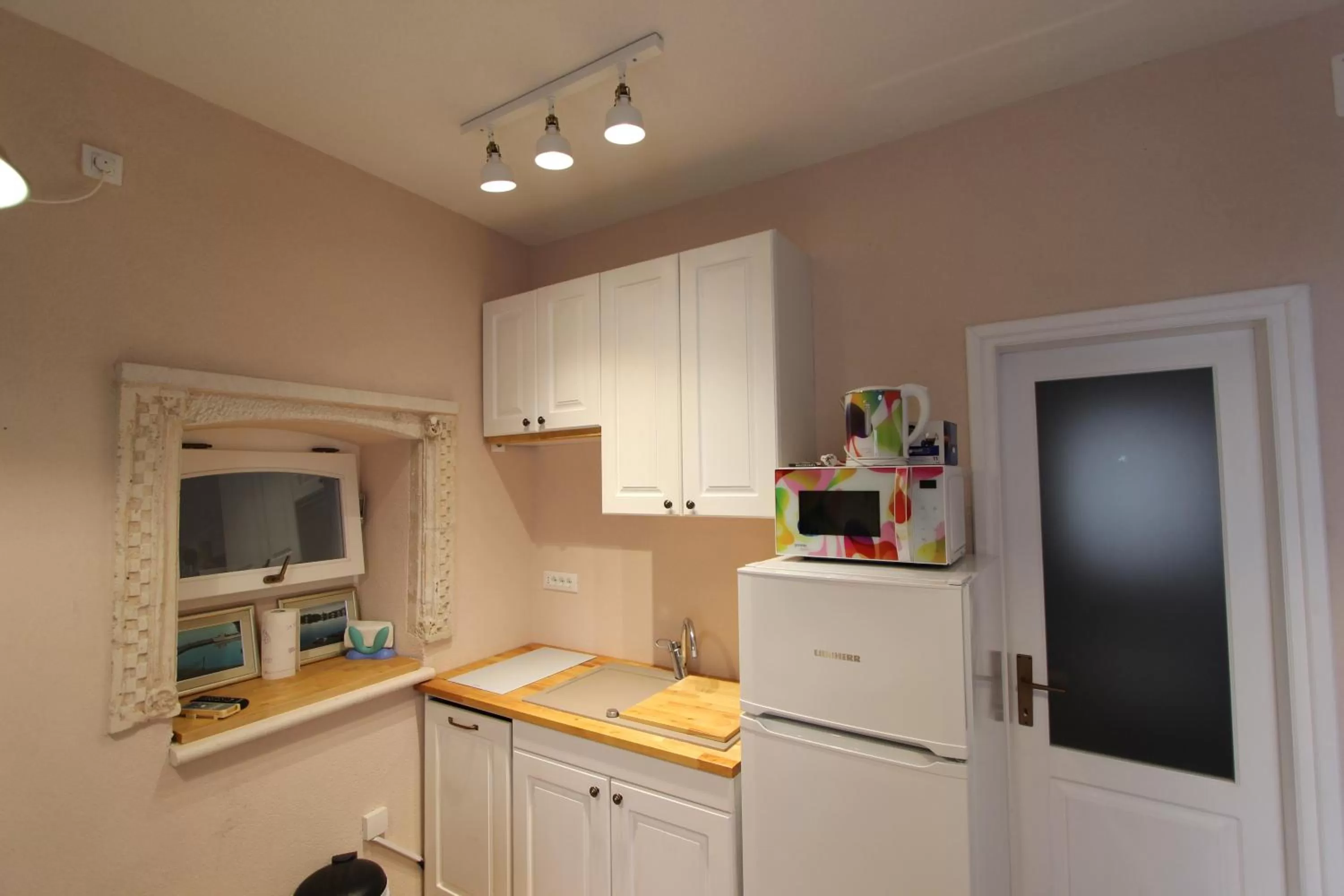 Kitchen or kitchenette in Central Apartments Integrated Hotel