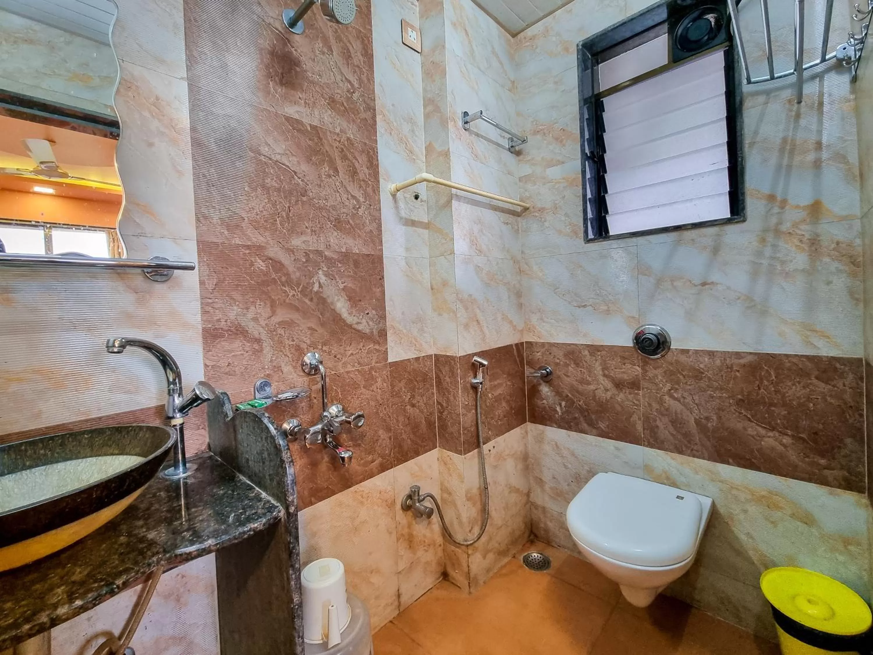 Bathroom in Pooja Villa Suites-Rooms and Pool, Igatpuri