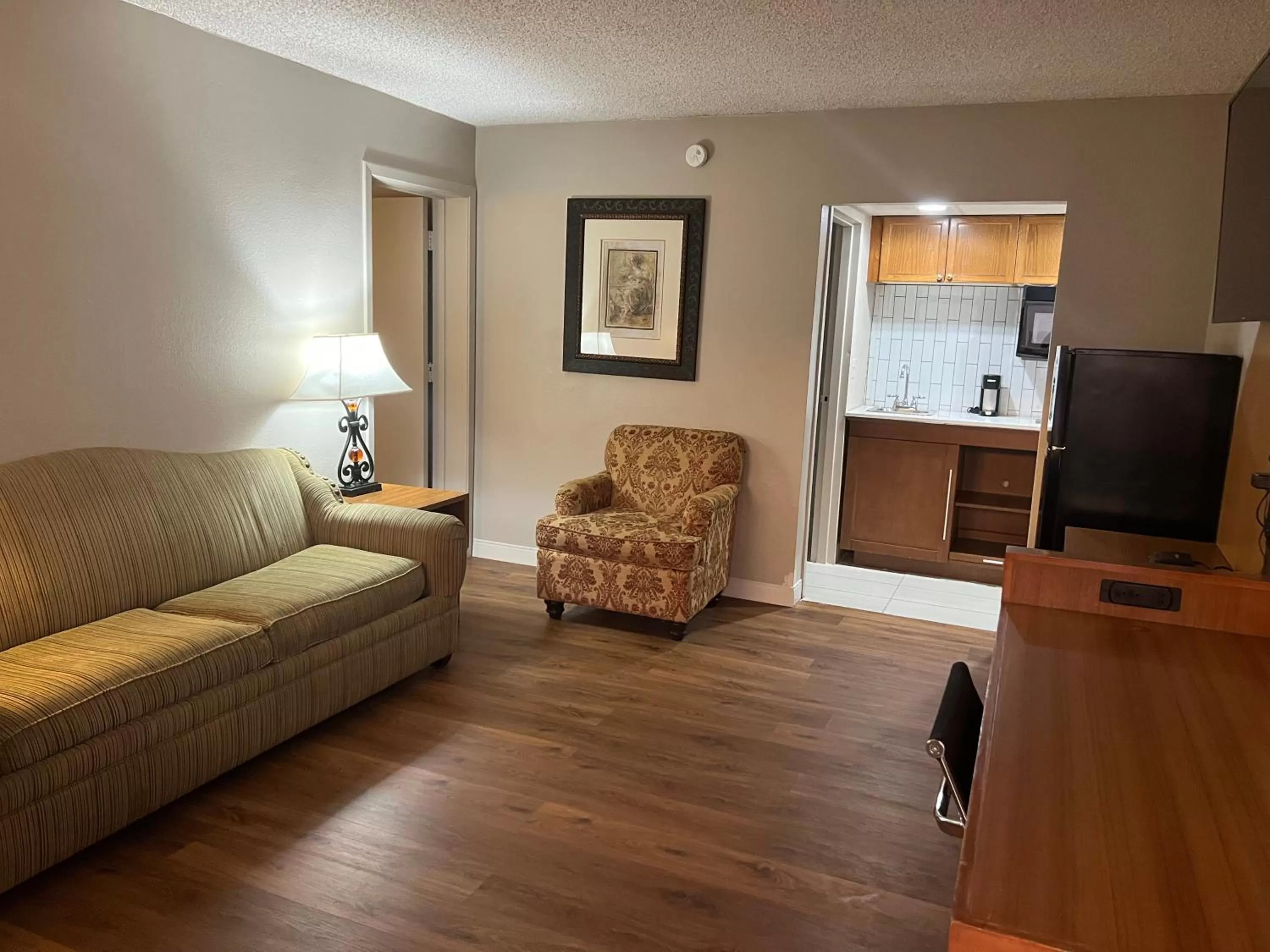 Living room in Baymont Inn by Wyndham Odessa University Area