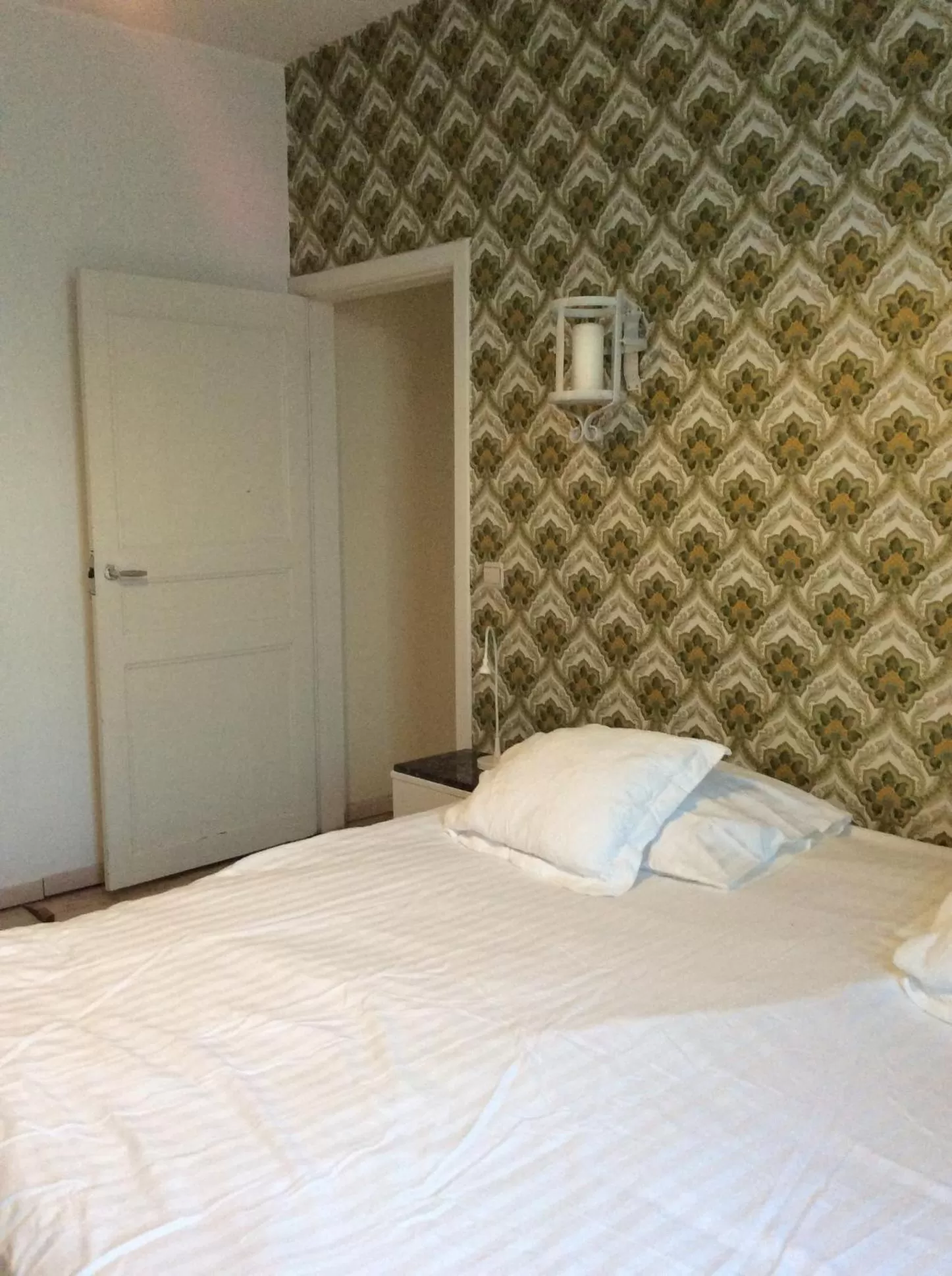 Decorative detail, Bed in Beaux Temps b&b