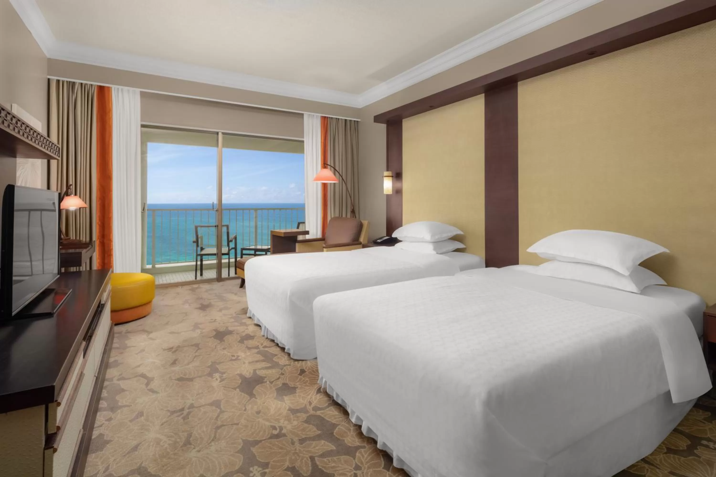 Bed in RIHGA Royal Laguna Guam Resort