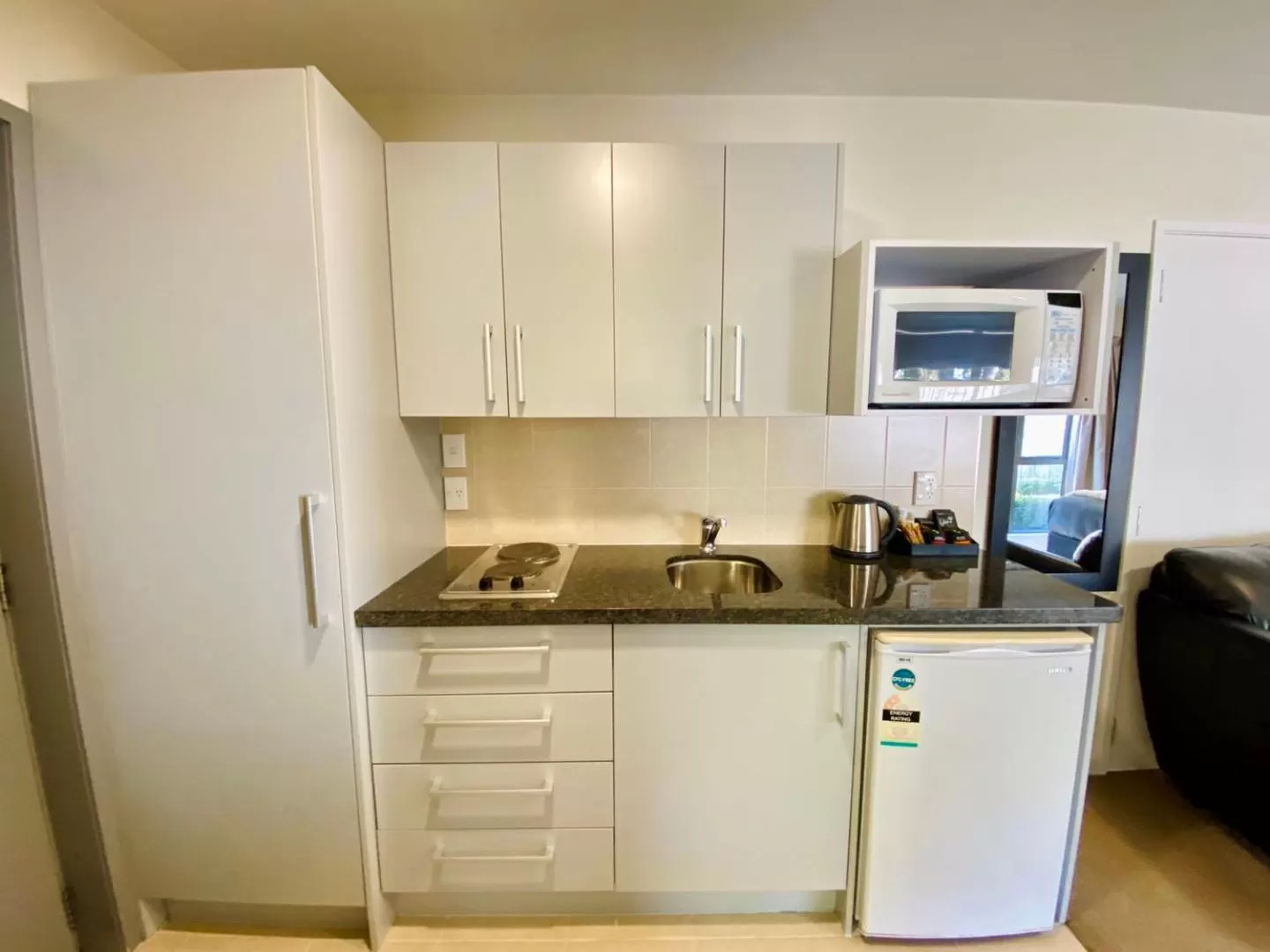 Kitchen or kitchenette in Alpha Motel with Spa-Bath