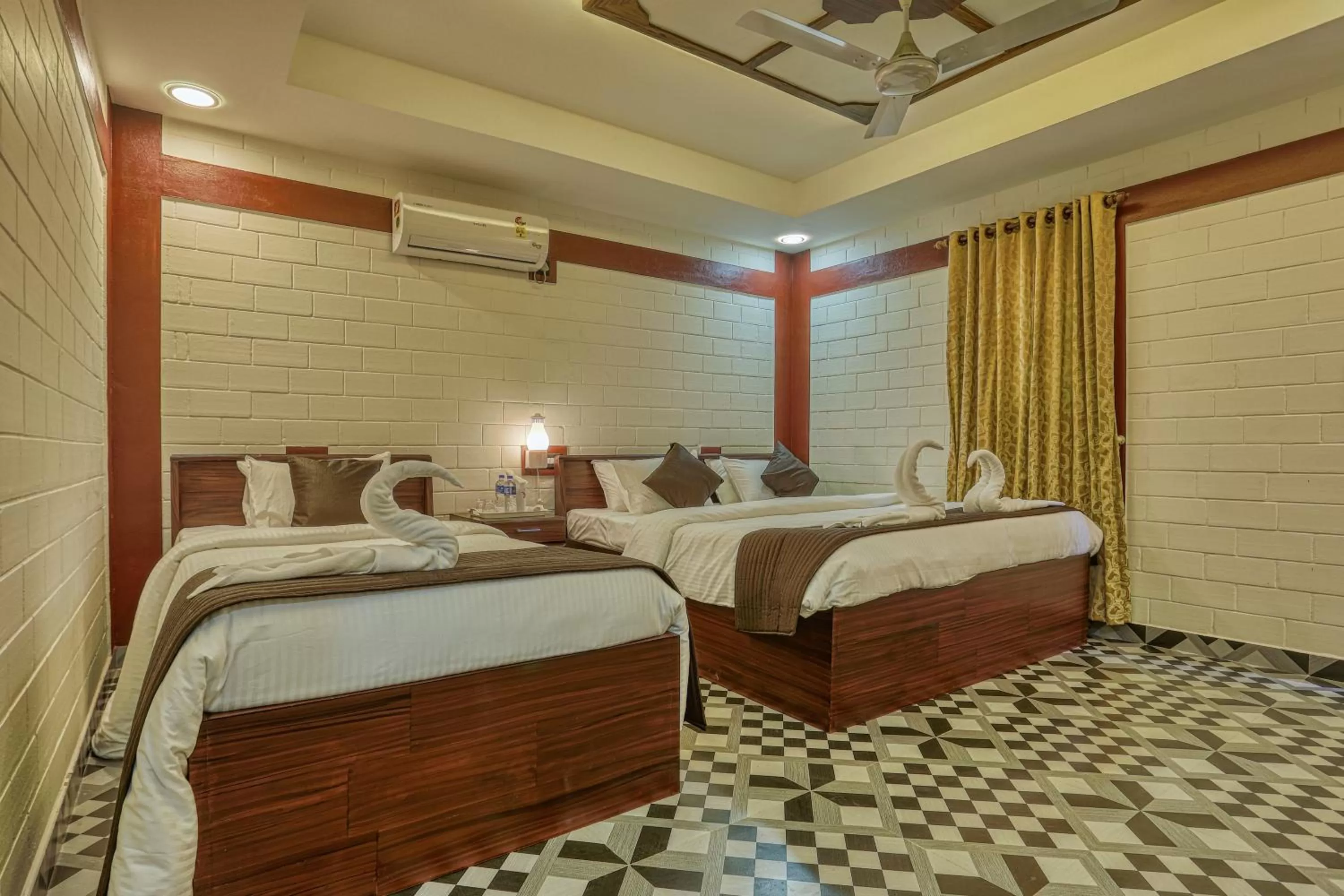 Bed in LEISURE VALLEY BEACH RESORT