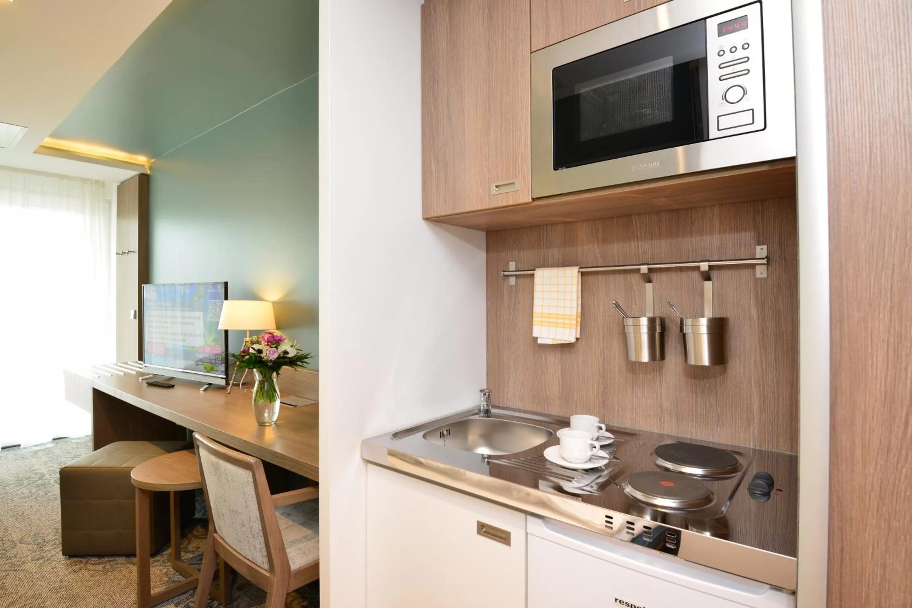 Kitchen or kitchenette in Parkhotel Residenz