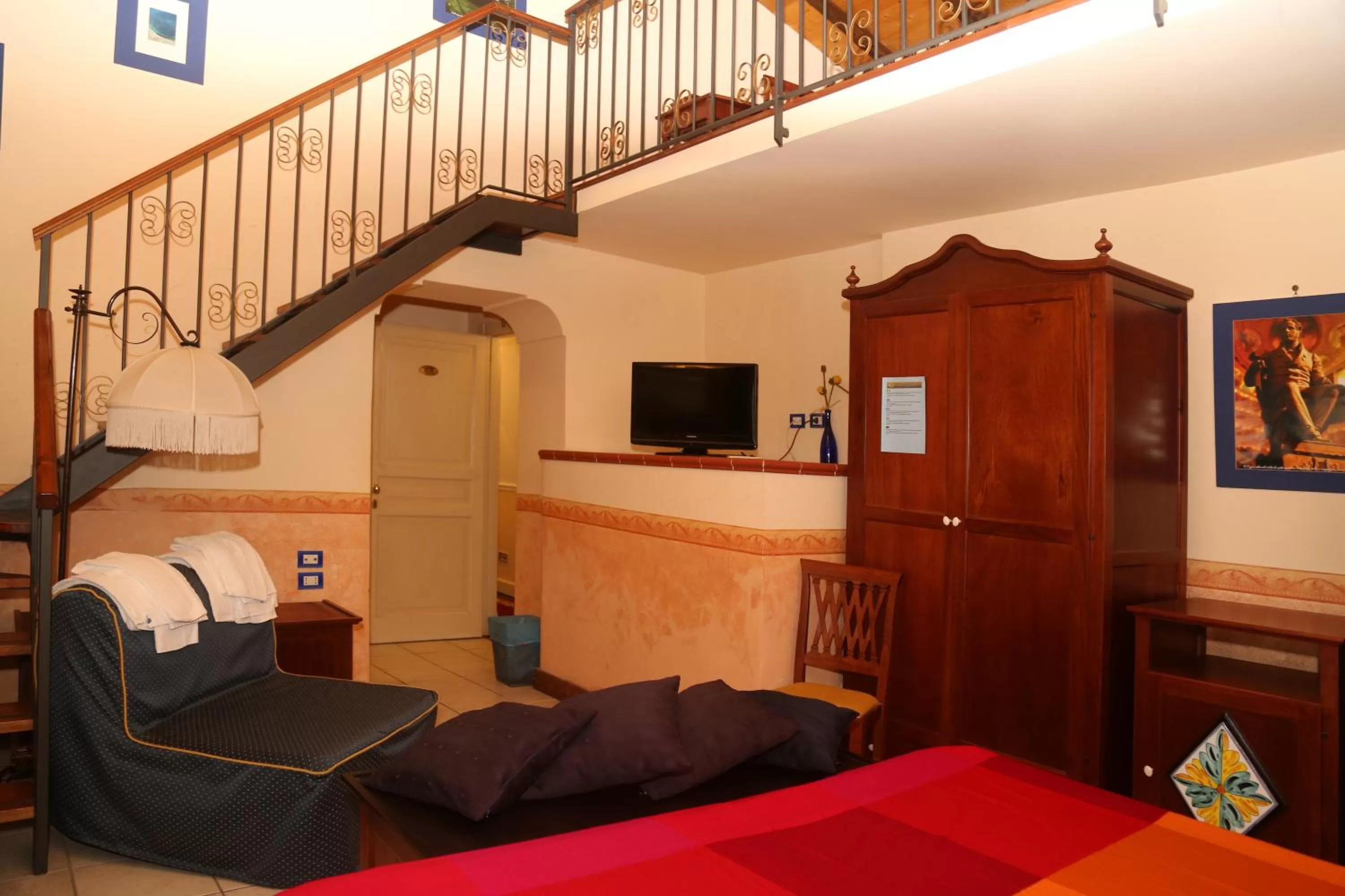 Photo of the whole room, Bed in Hotel Sangiuliano 132 centro storico Catania