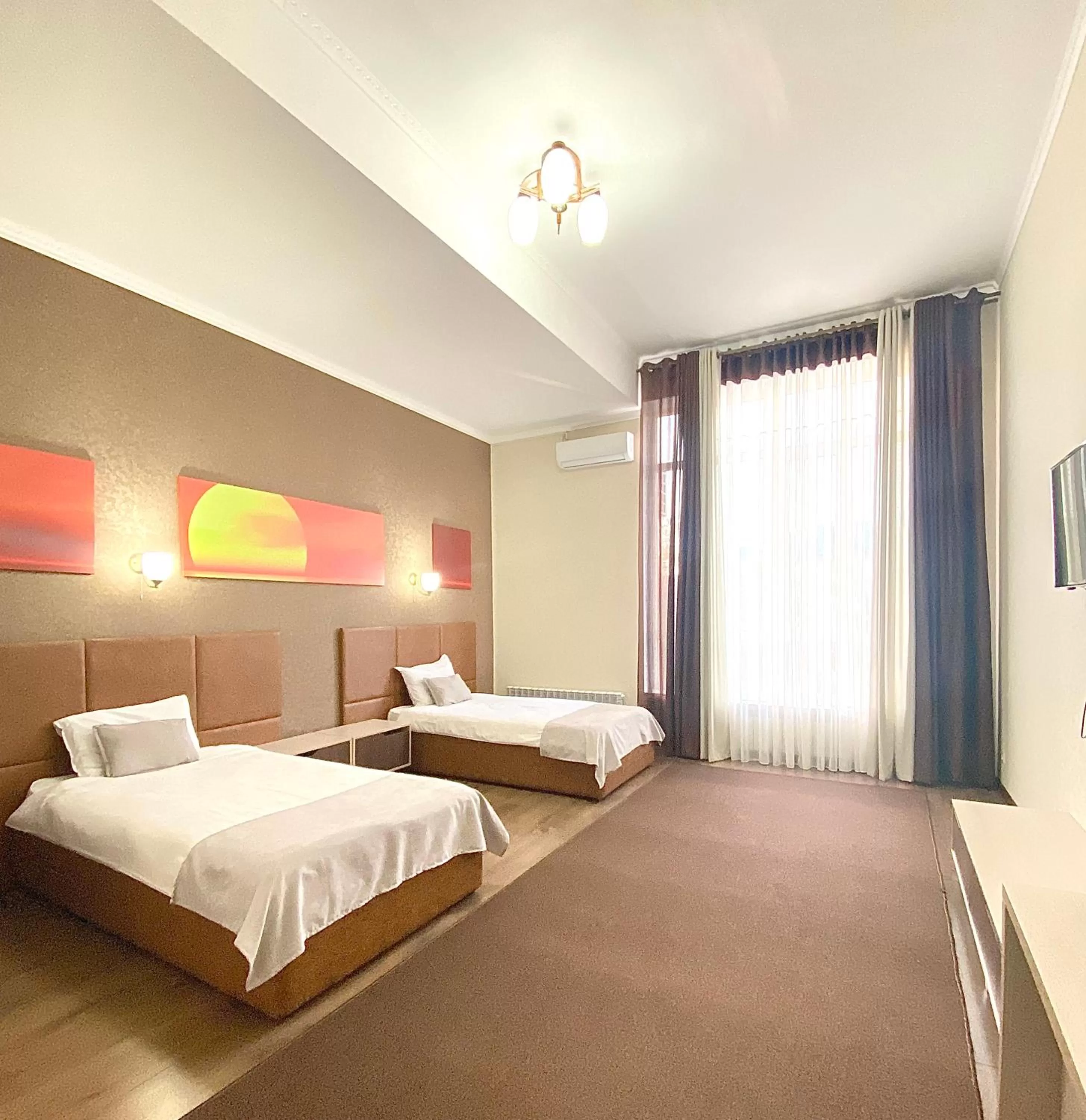 Bed in Caravan Hotel