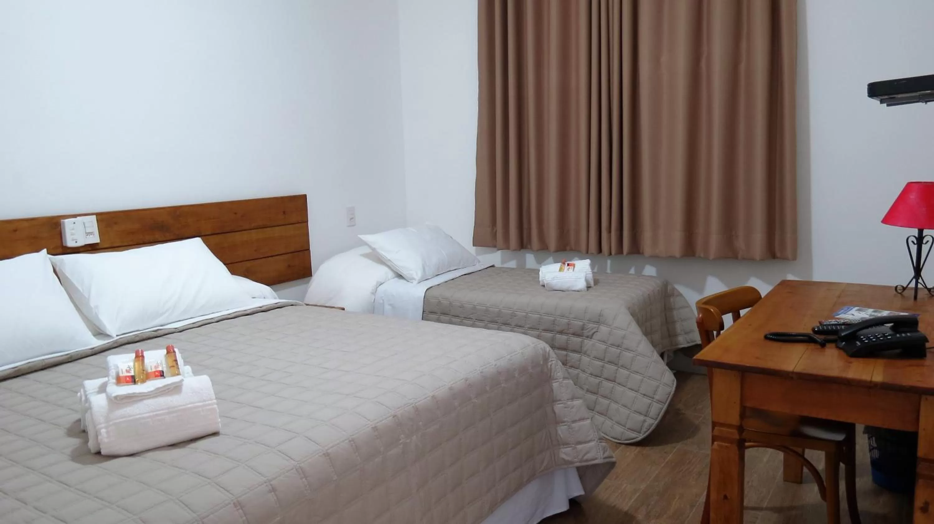 Bed in Pousada Sagrados Corações