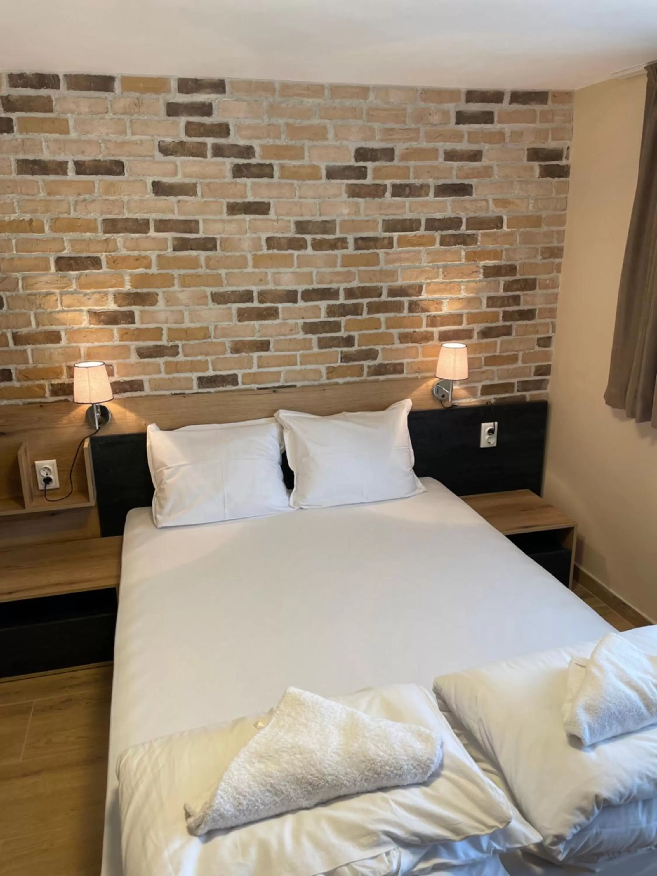 Bed in Family Hotel Malibu