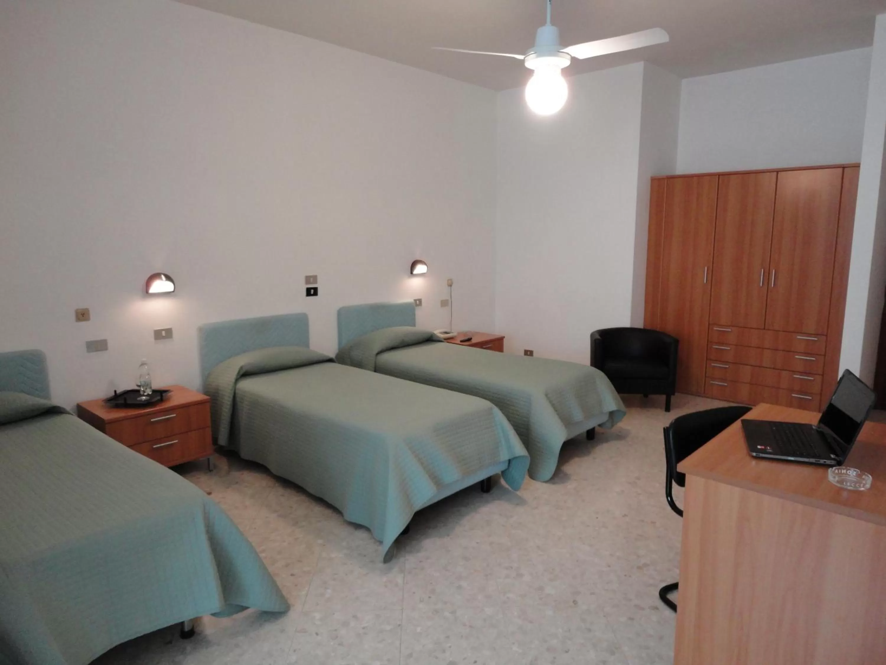 Bed in Hotel Riviera