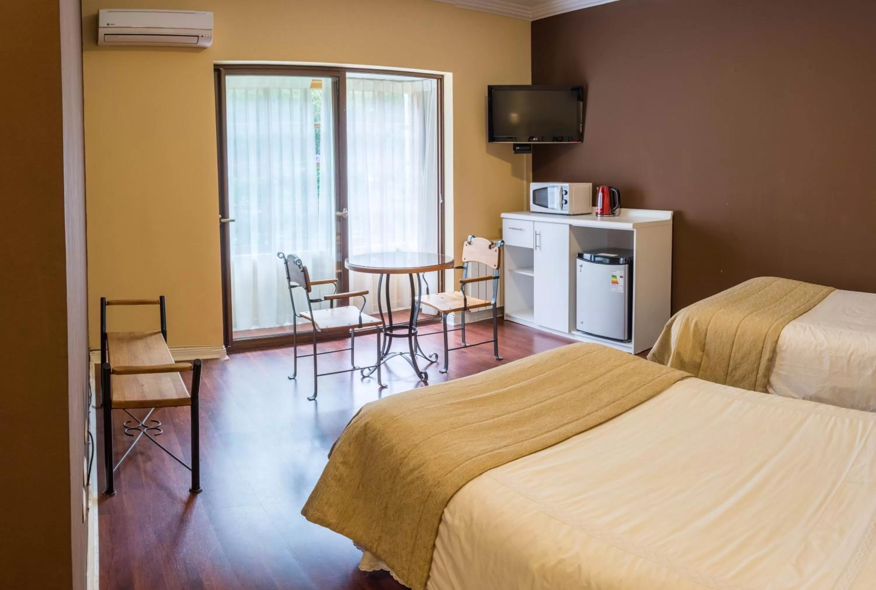 Bed in Hotel Inti Kuyen Plaza