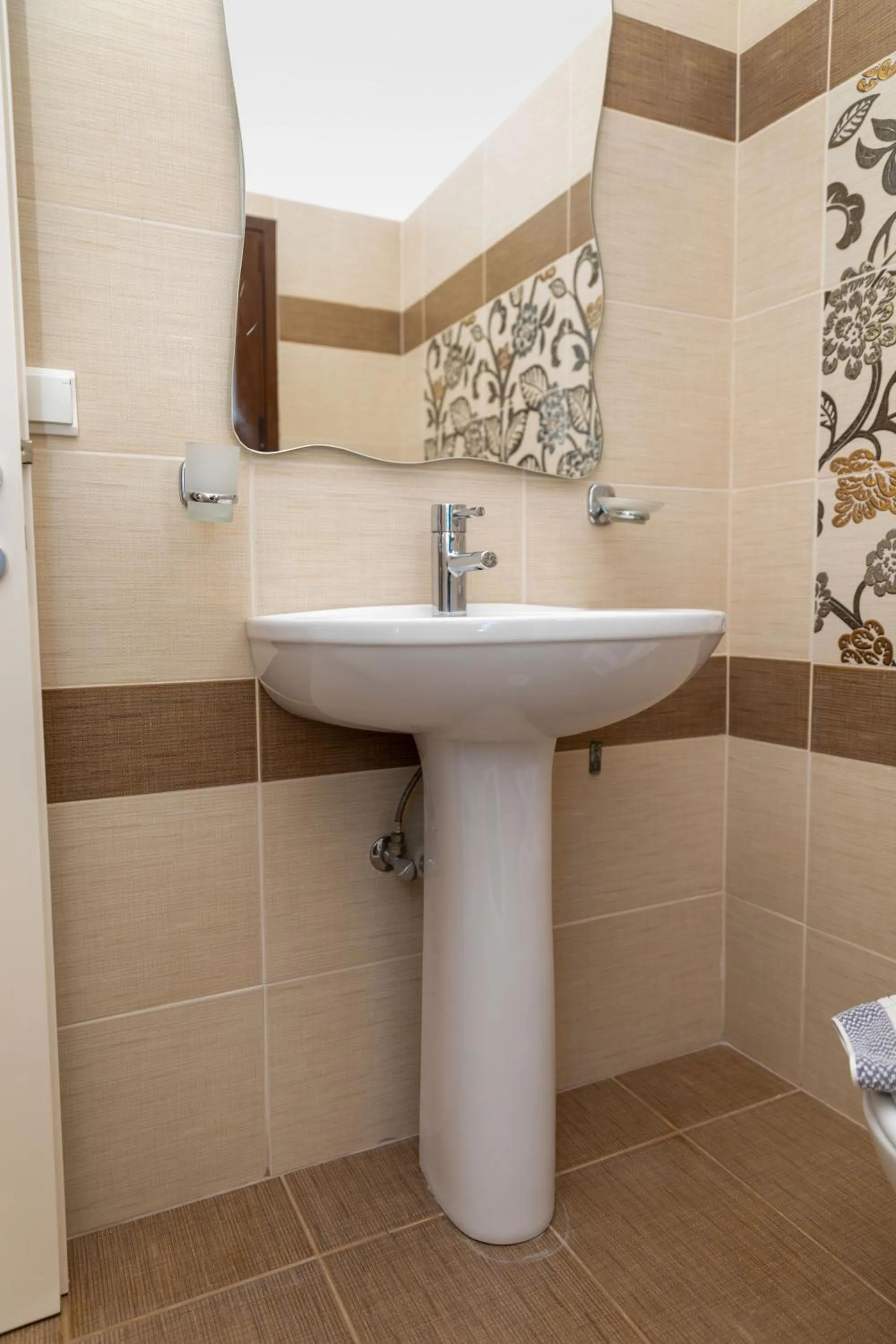 Bathroom in Depis Place and Apartments