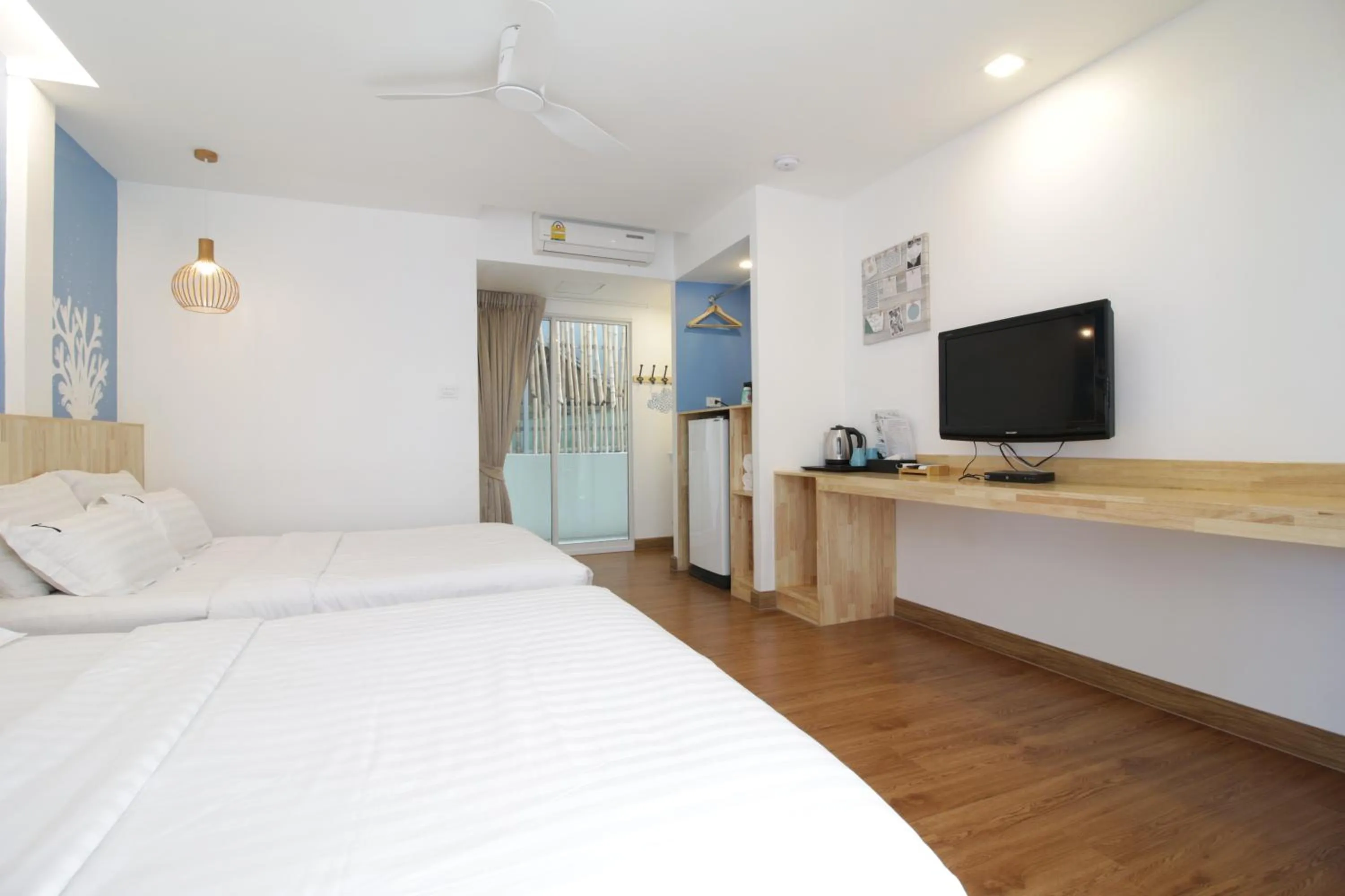 Bed in Tawaen Beach Resort