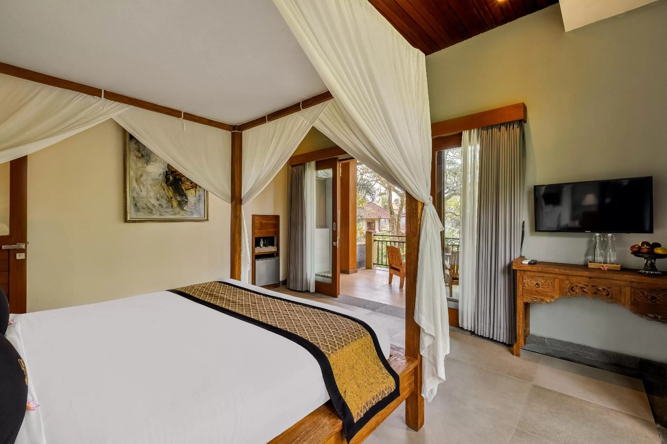 Bed in Kubu Rama Ubud Cottage