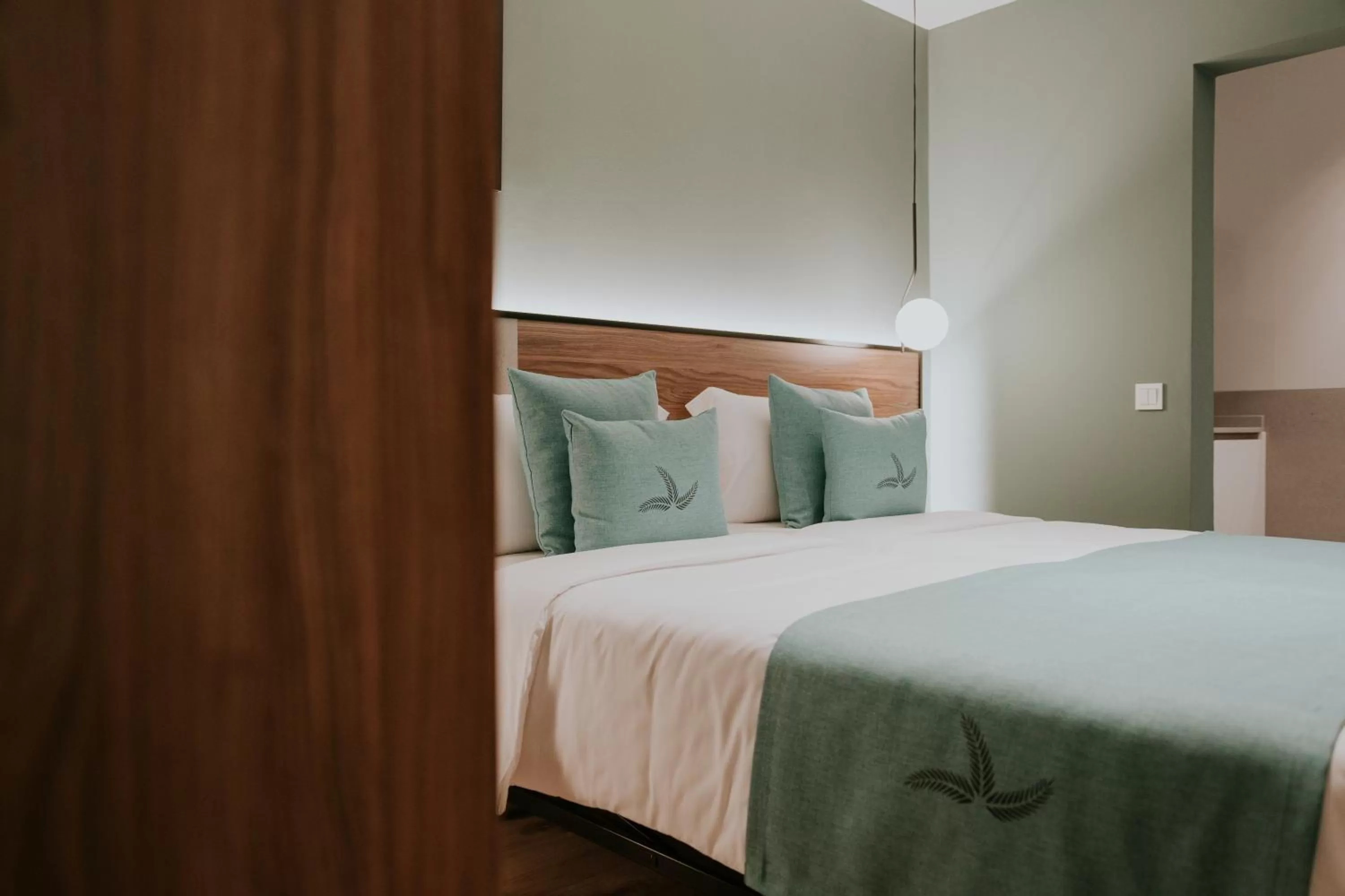 Bed in Catalina Plaza Hotel Sostenible