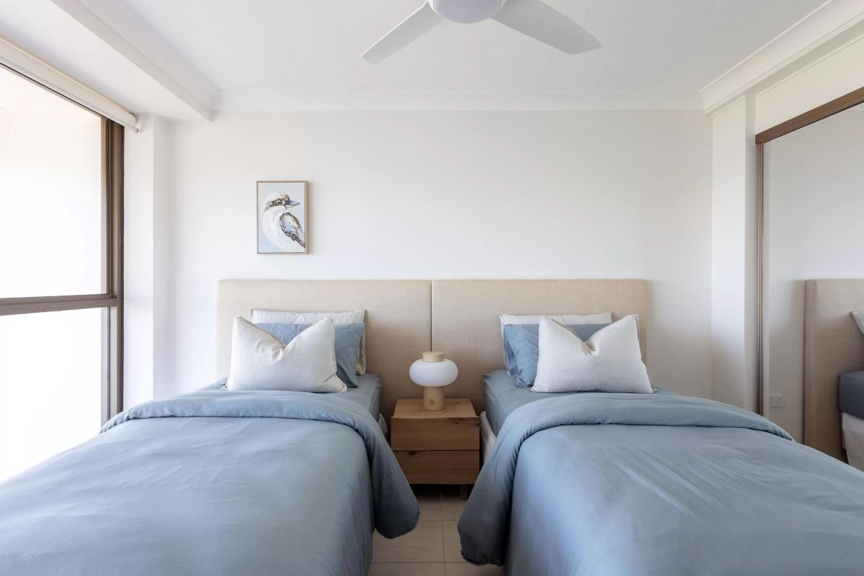 Bed in De Ville Apartments