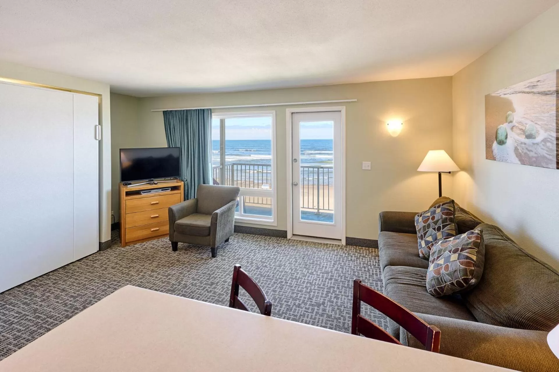 Bed, Seating Area in D Sands Rentals