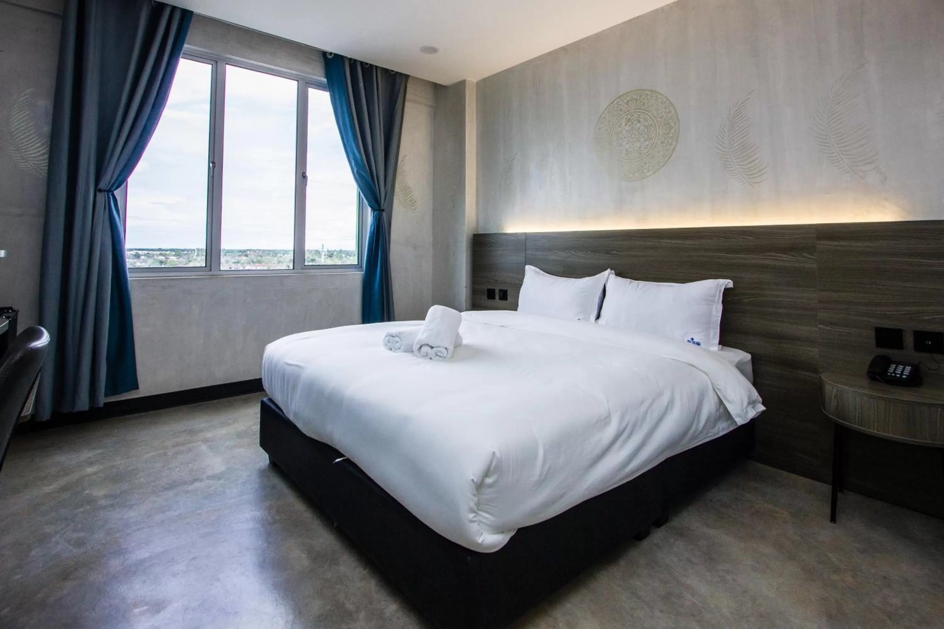 Bed in Sri Indar Hotel & Suites