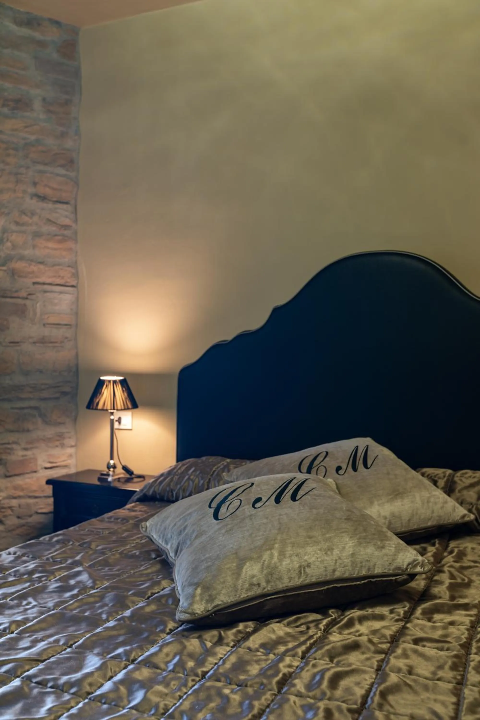 Bed in La Locanda Del Conte Mameli - Boutique Hotel & Suite SPA