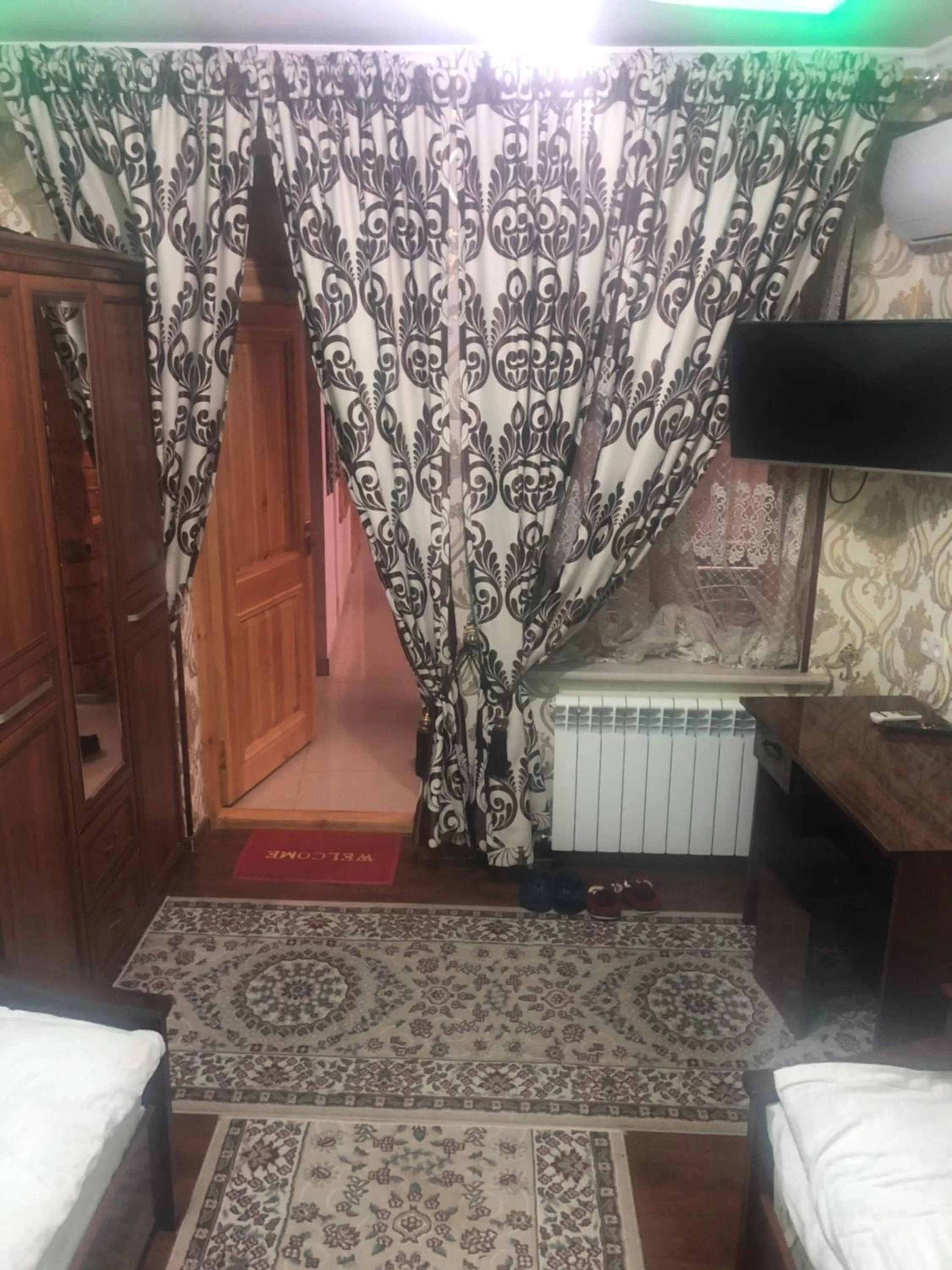 Bed in Tilyakori Hotel