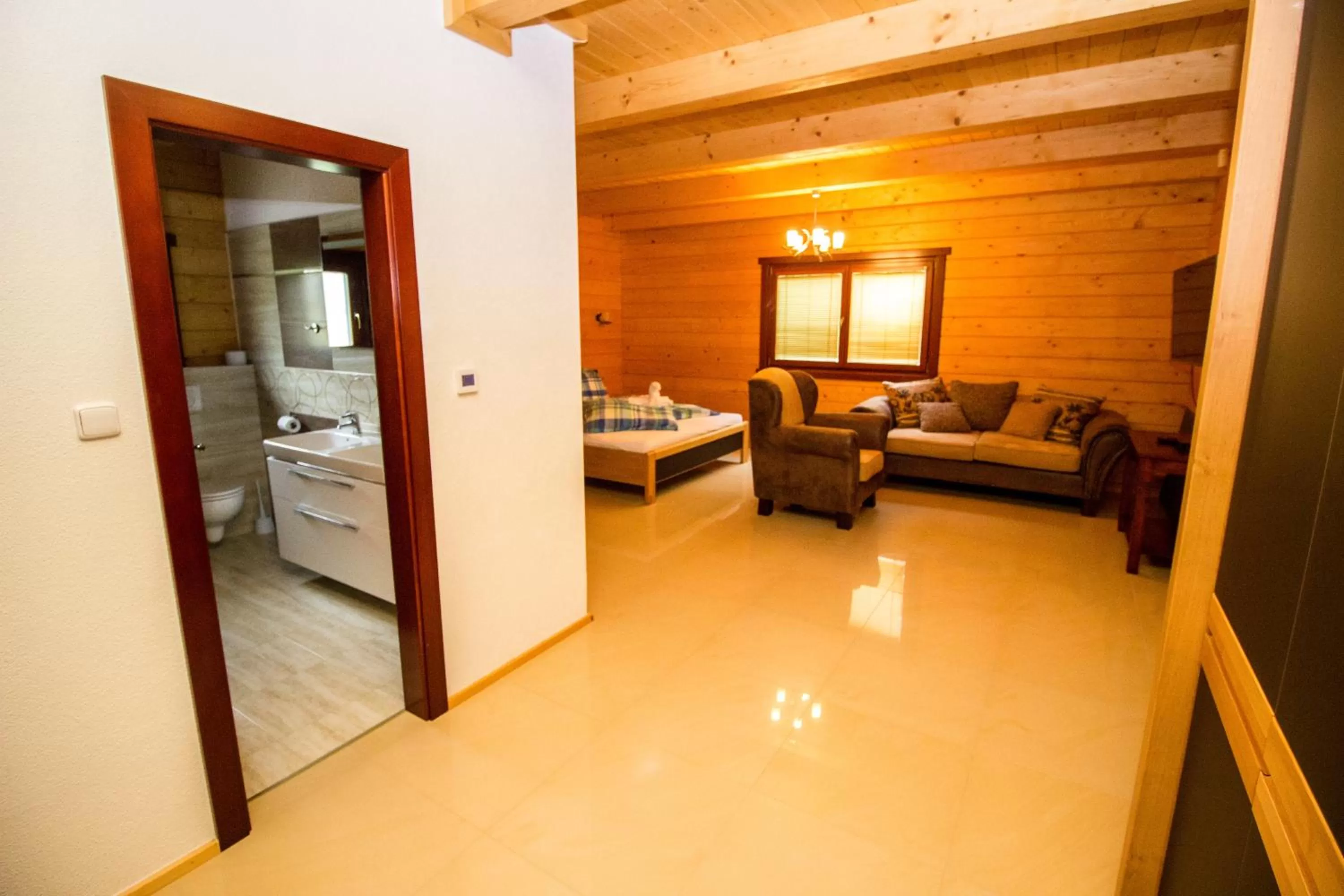 Seating area, Bed in SKI CIERNY BALOG