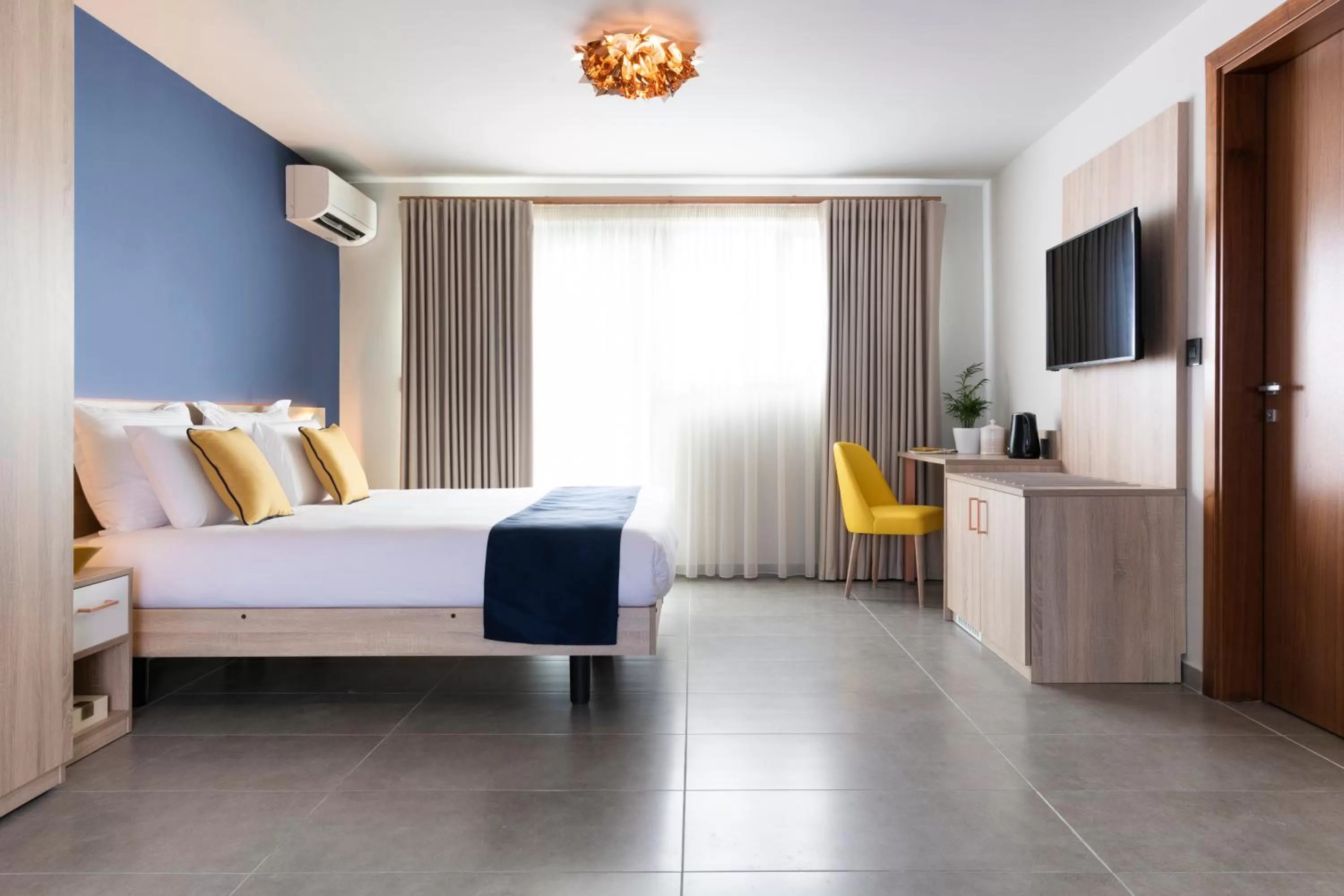 Bed in Antoniel Suites