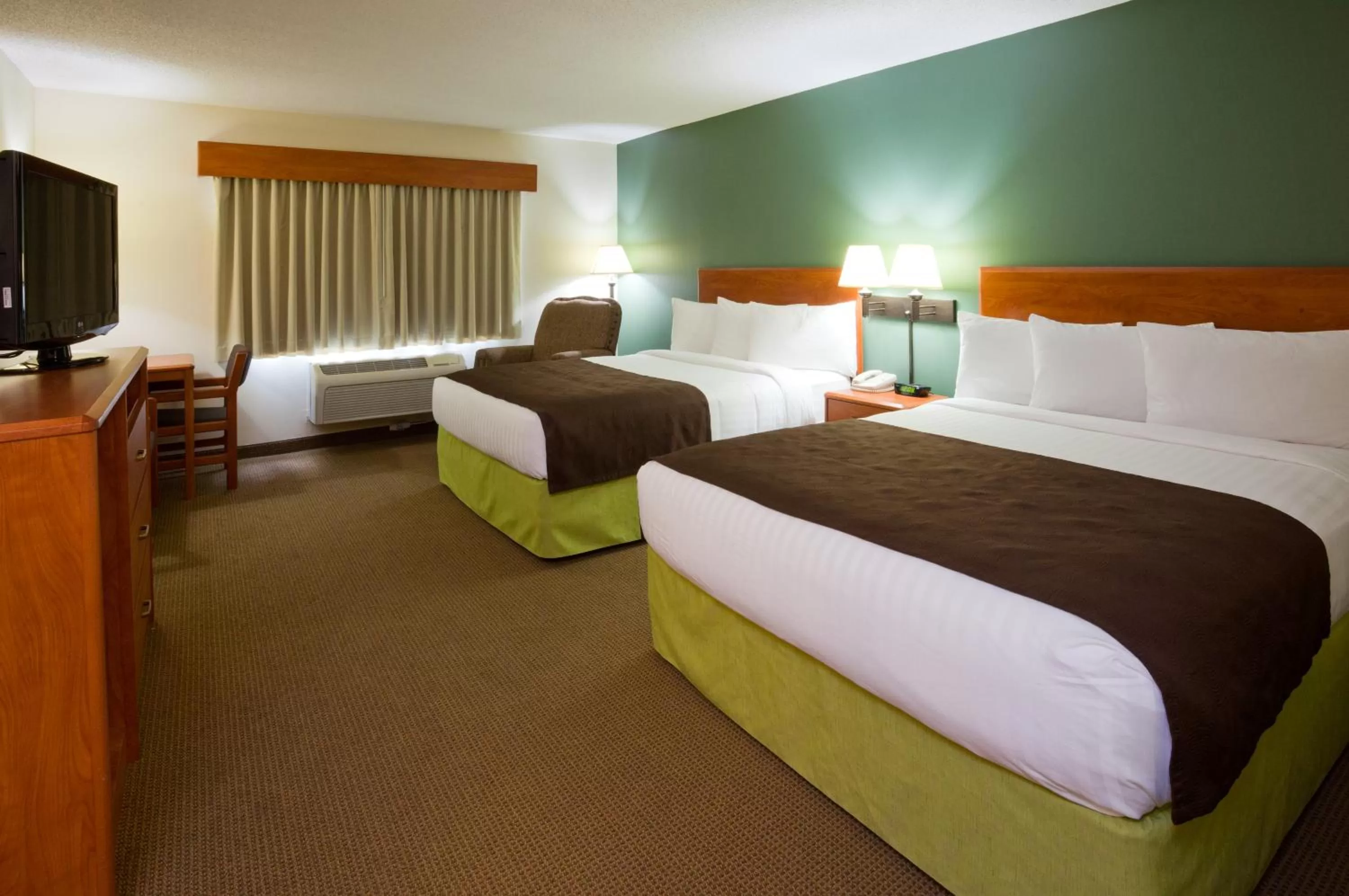 Bed in AmericInn by Wyndham Thief River Falls