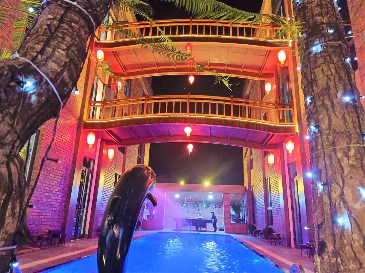 Pool view, Property Building in Cozynibi Hotel