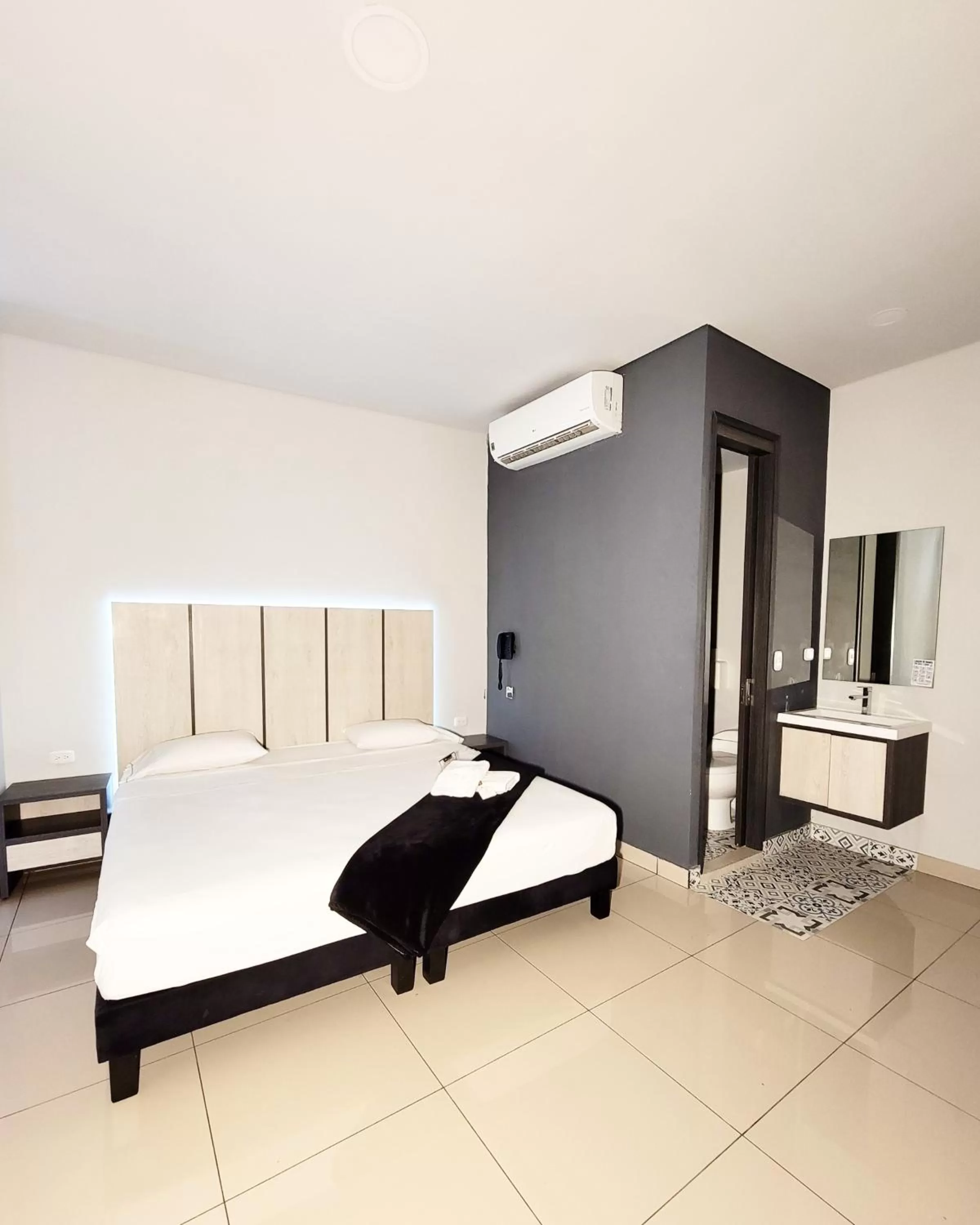 Photo of the whole room, Bed in HOTEL NABU VALLEDUPAR