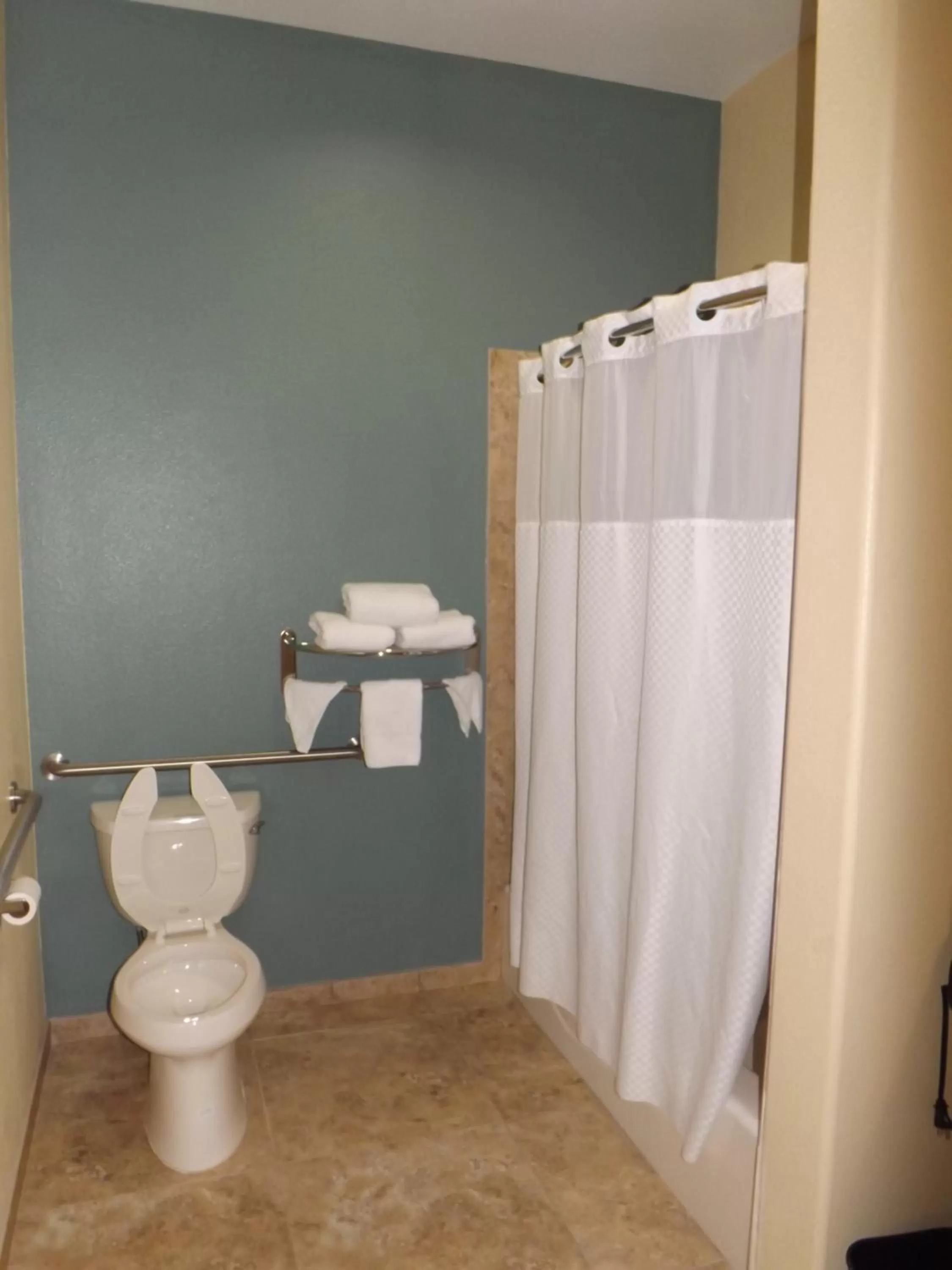 Toilet in Sunriser Inn