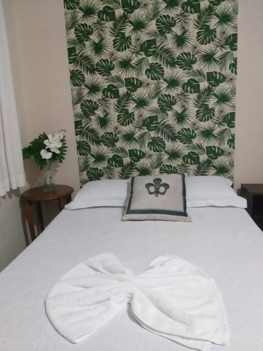 Bed in Pousada Dois Rios