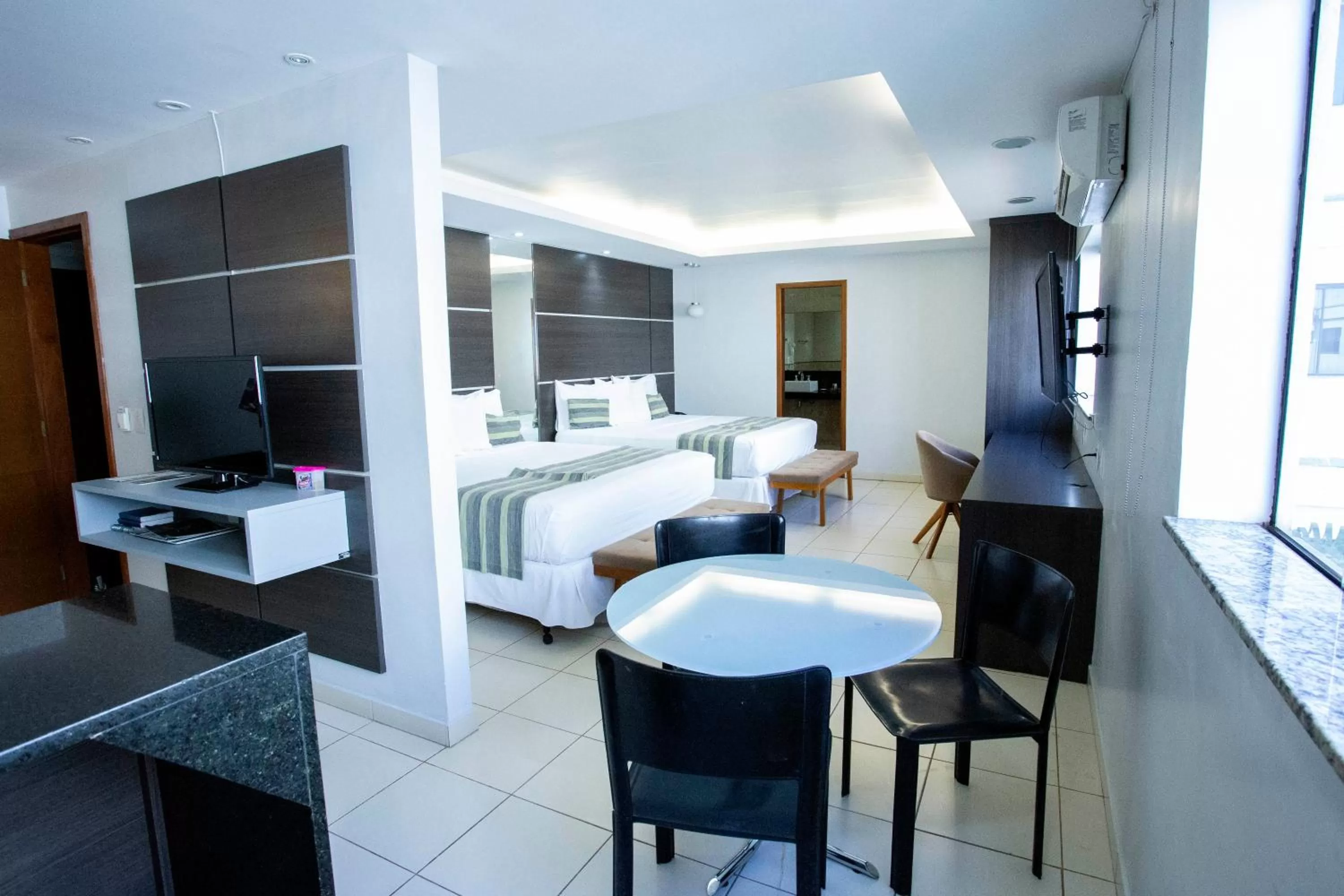 Bed in Atrium Confort Hotels