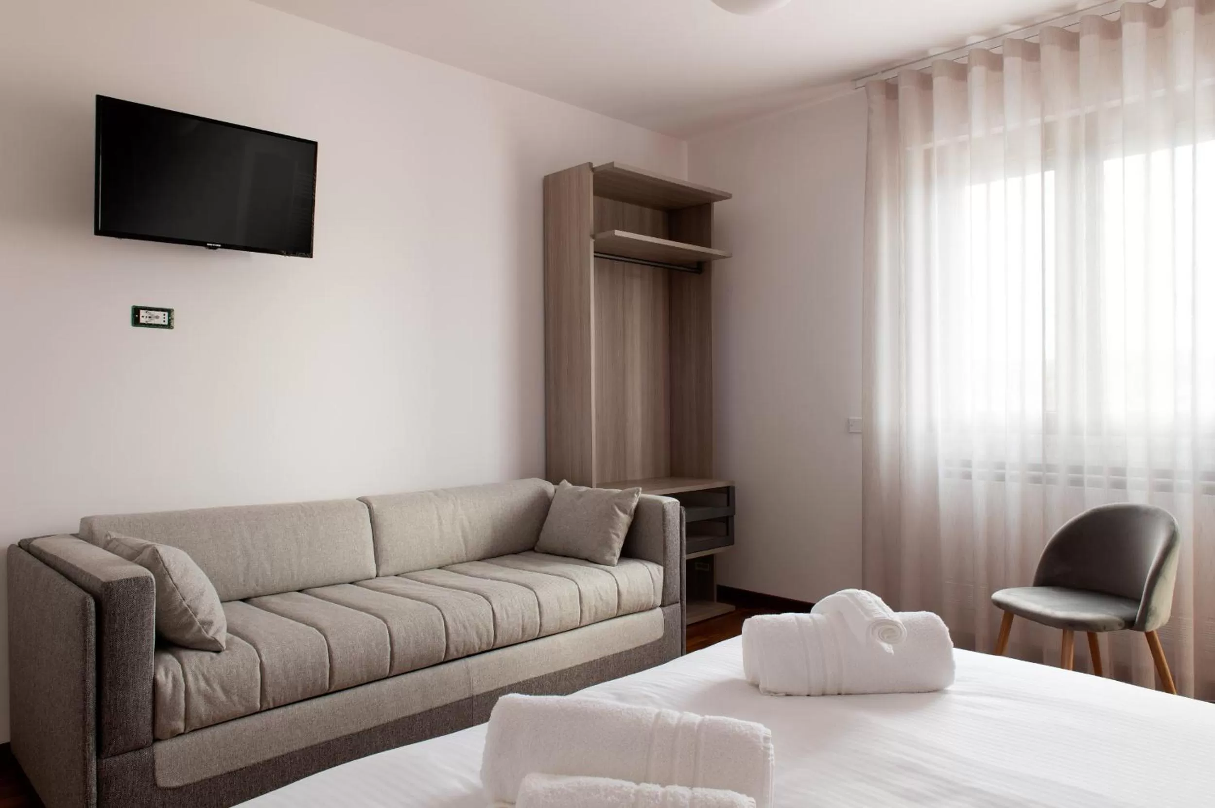 Communal lounge/ TV room, Seating Area in B&B Monna Lisa Rooms