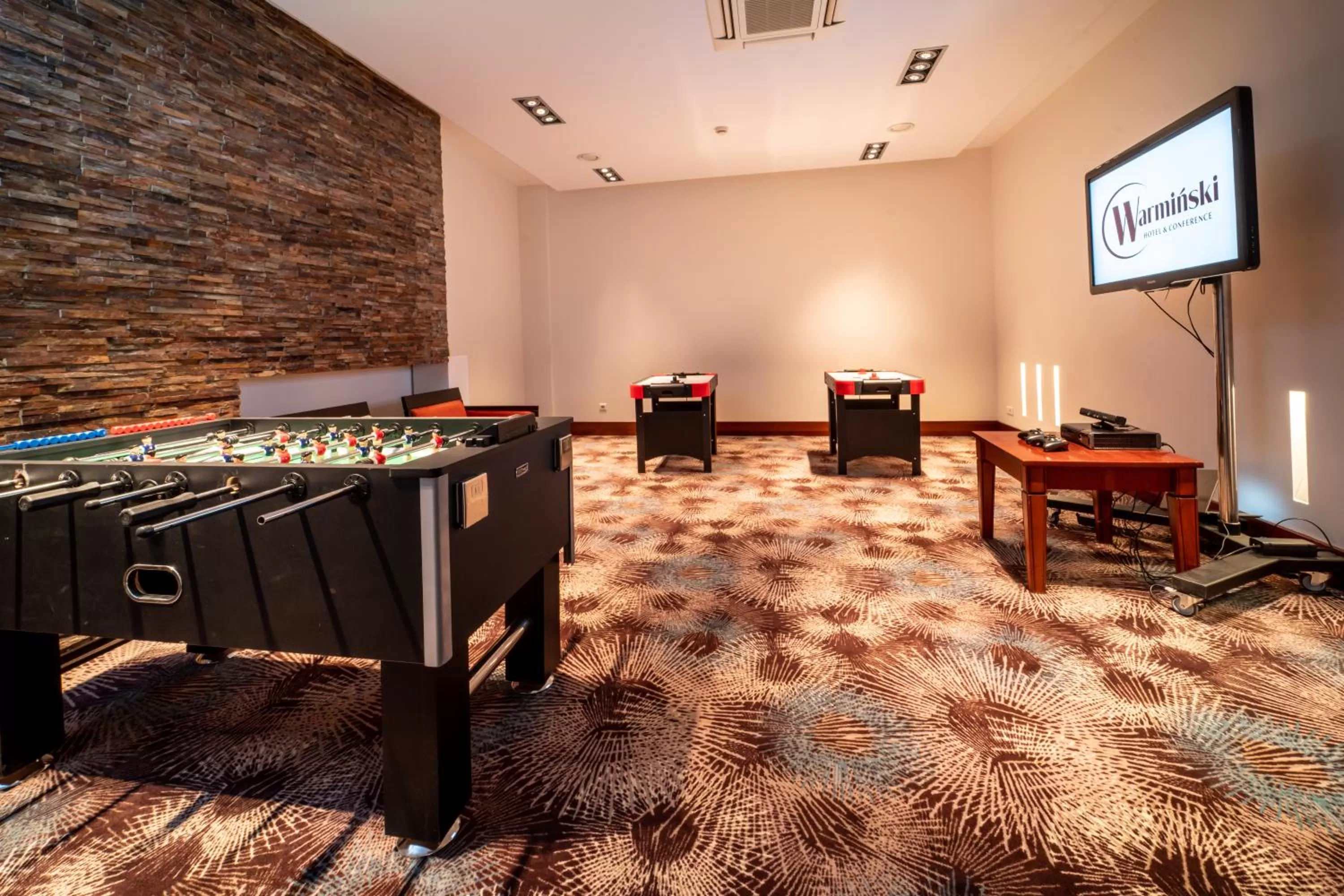 Communal lounge/ TV room in Warmiński Hotel & Conference