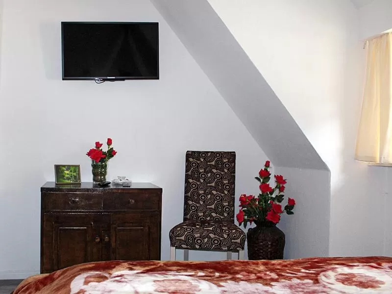 Bedroom, TV/Entertainment Center in Forsthaus-Ferienhotel am Dobrock