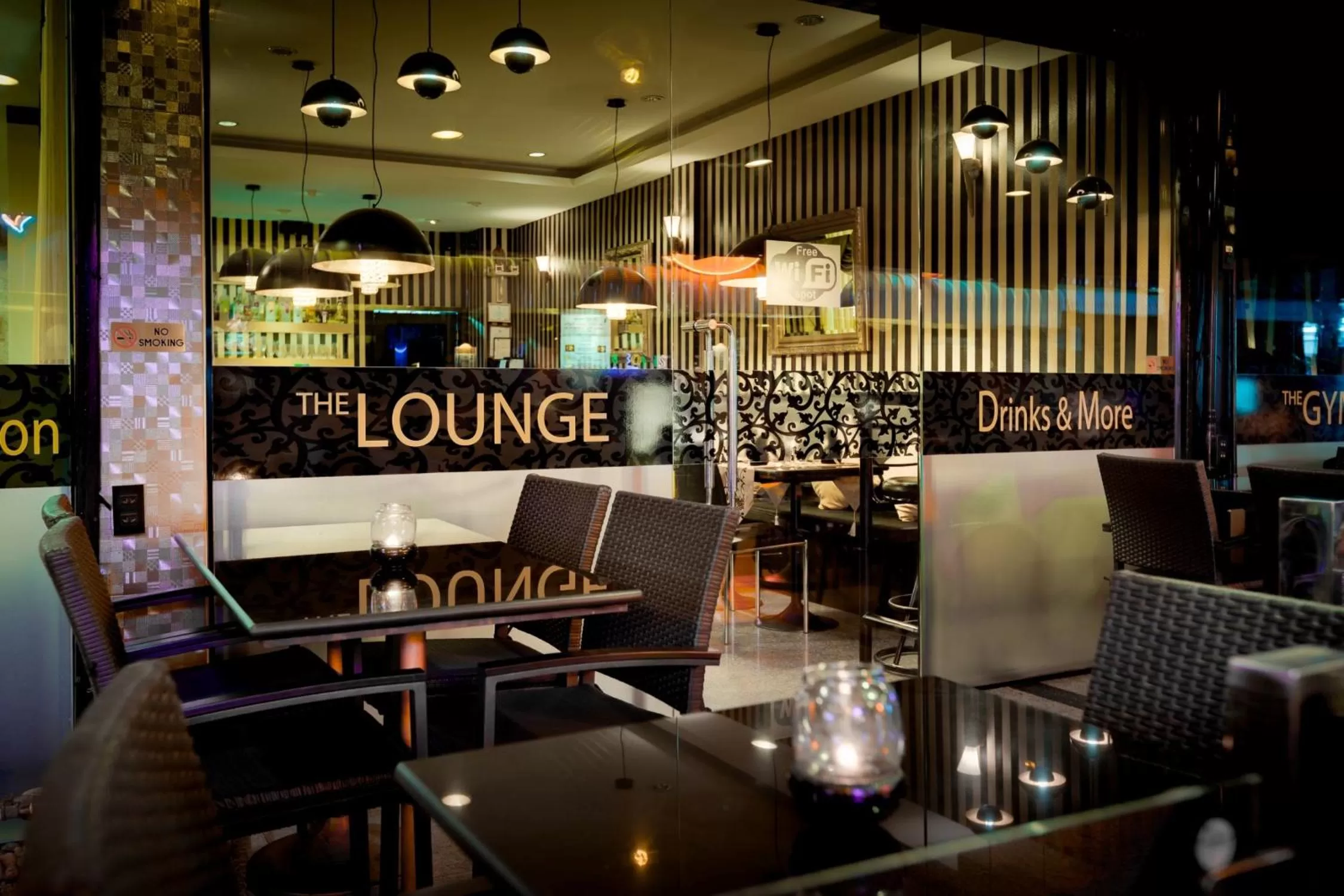 Lounge or bar in The Ambiance Hotel