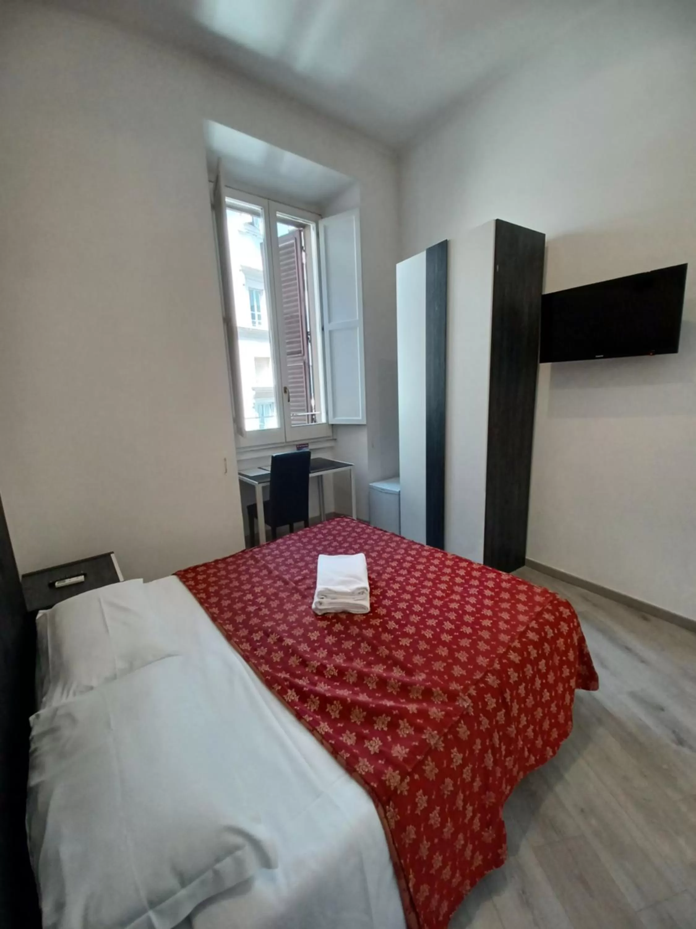 Bed in Hotel Mimosa Pantheon