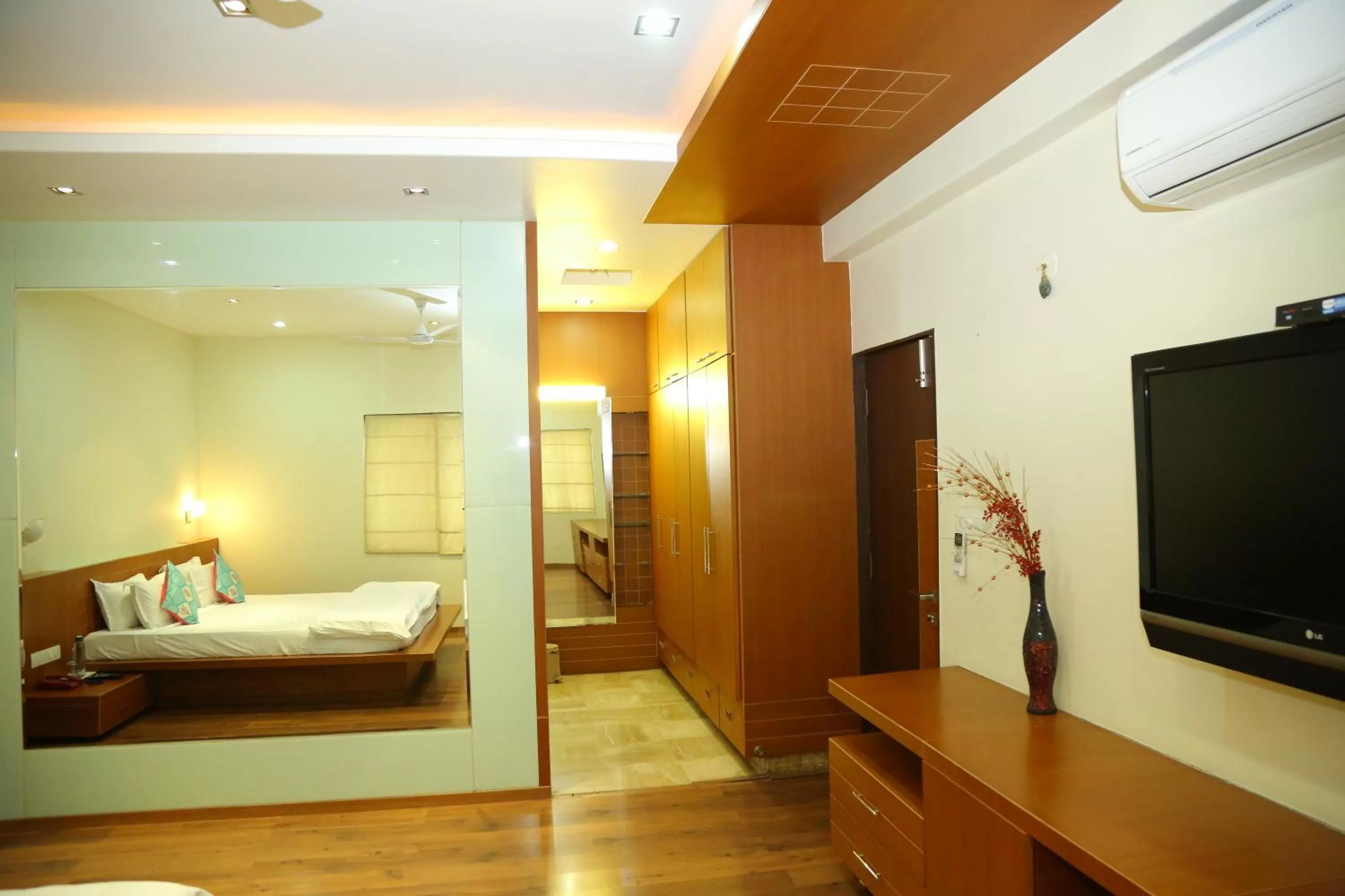 Bedroom, TV/Entertainment Center in Swan Suites Madhapur