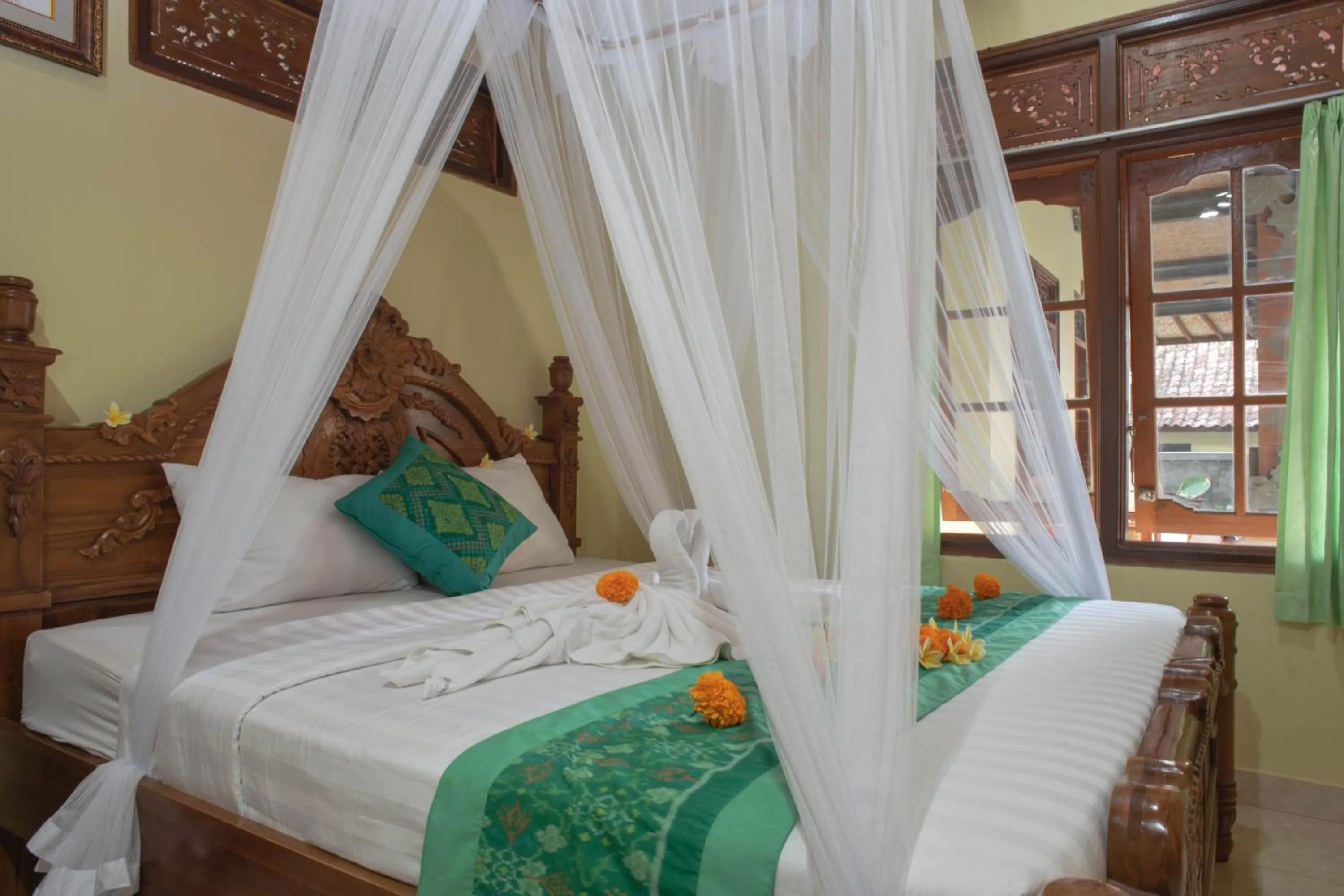Bed in Suparsa's Homestay